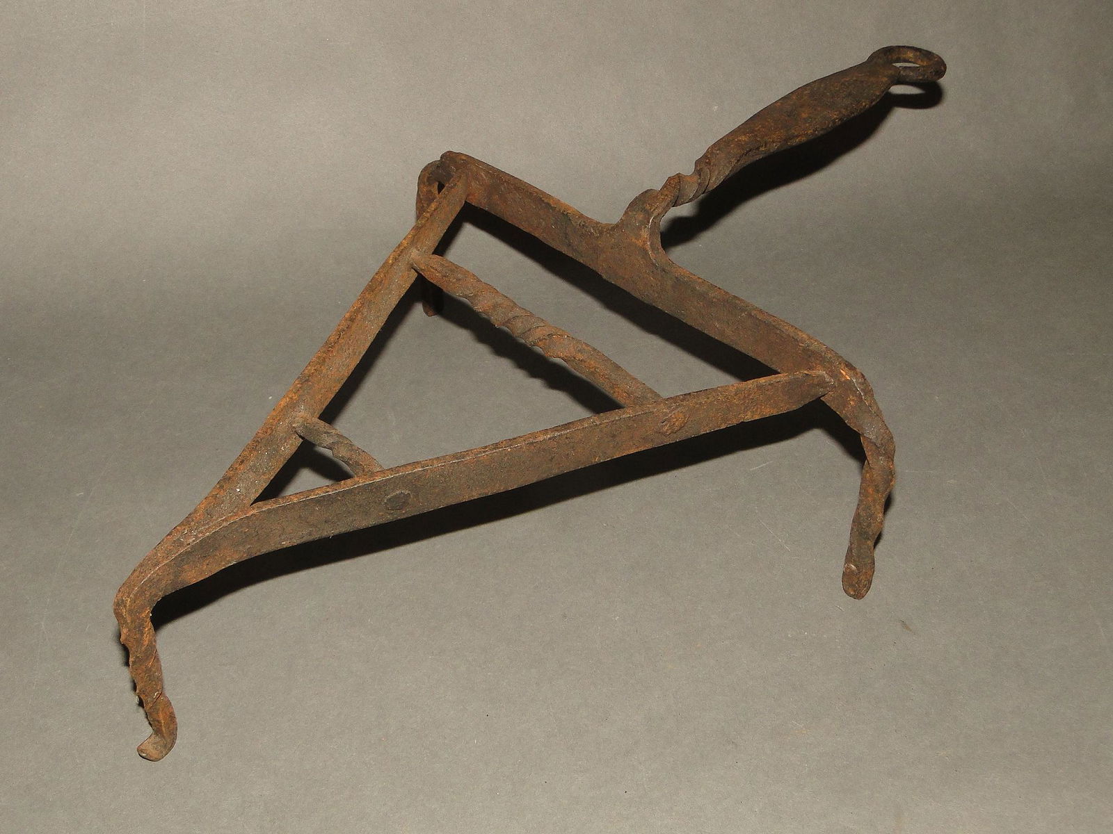 18TH C TRIANGULAR IRON TRIVET (1 of 2)