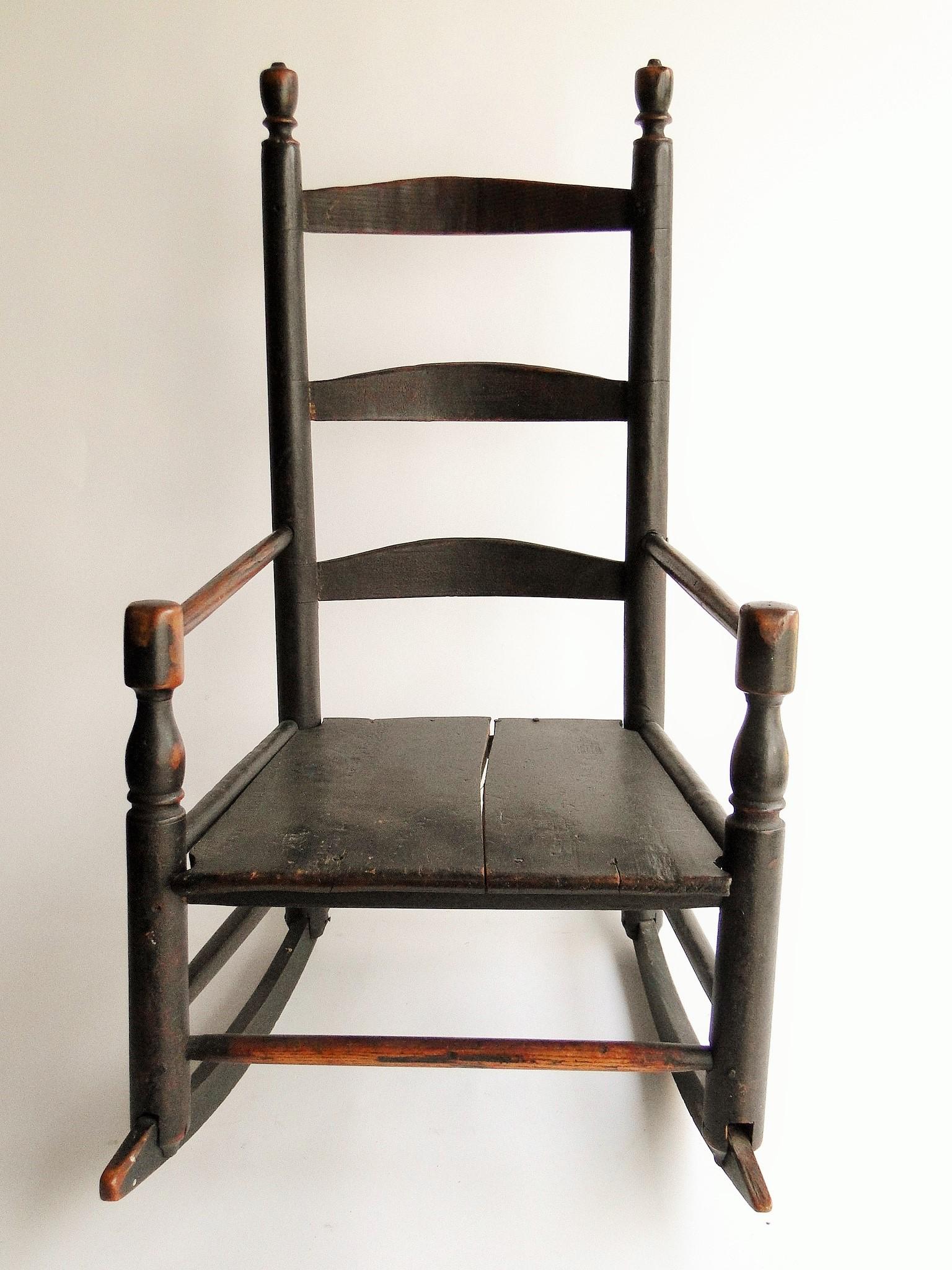 C. 1710-1730 CHILD'S WILLIAM AND MARY PAINTED ARMCHAIR: C. 1710-1730 CHILD'S WILLIAM AND MARY PAINTED THREE SLAT ARMCHAIR ROCKER IN OLD SPANISH BROWN PAINT, CT. ORIGIN, 28 X 16 X 10