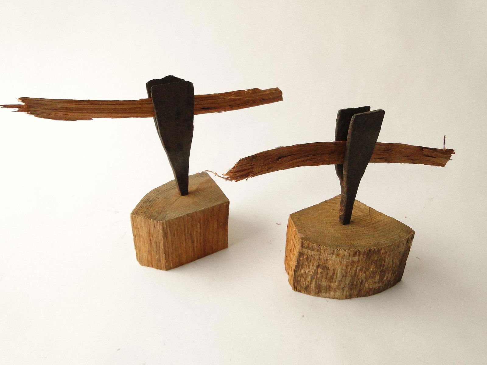 PAIR 18TH C WEDGE JAW SPLINT HOLDERS: PAIR 18TH C WEDGE JAW SPLINT HOLDERS, WROUGHT IRON, MAKE DO WOOD BASE, 6"