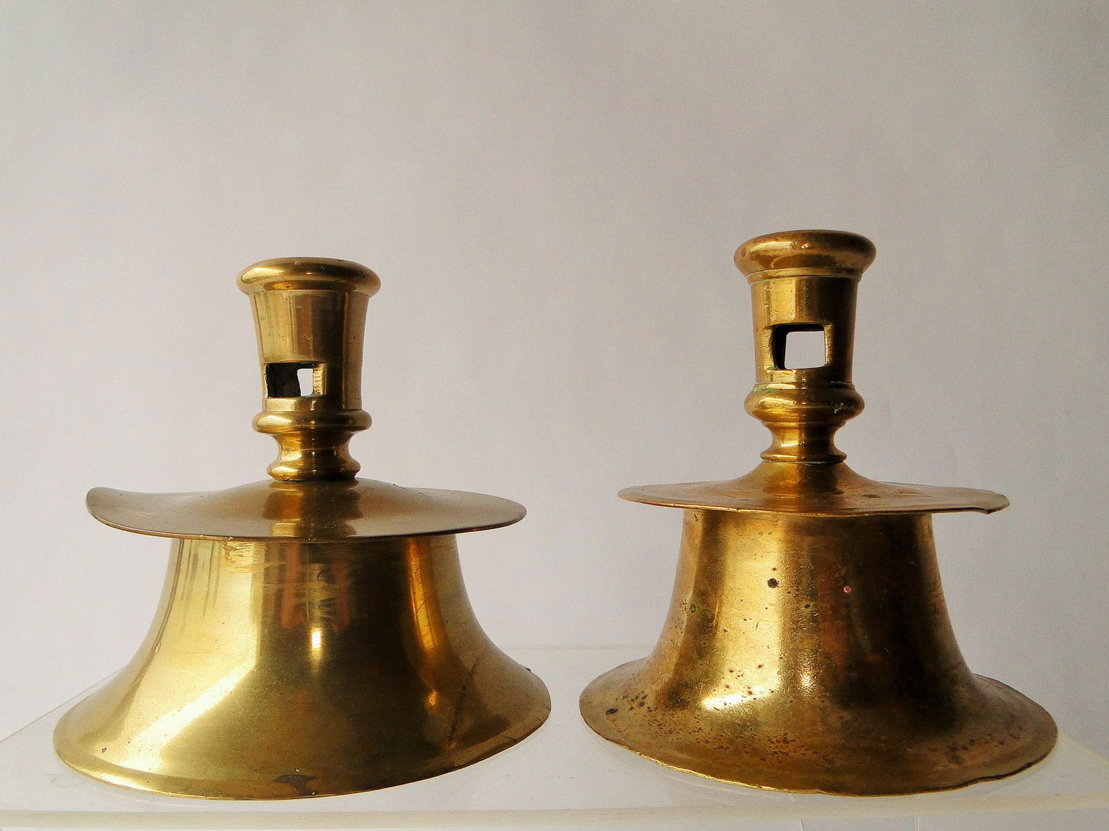 VERY NEAR PAIR EARLY CAPSTAN CANDLESTICKS (1 of 4)