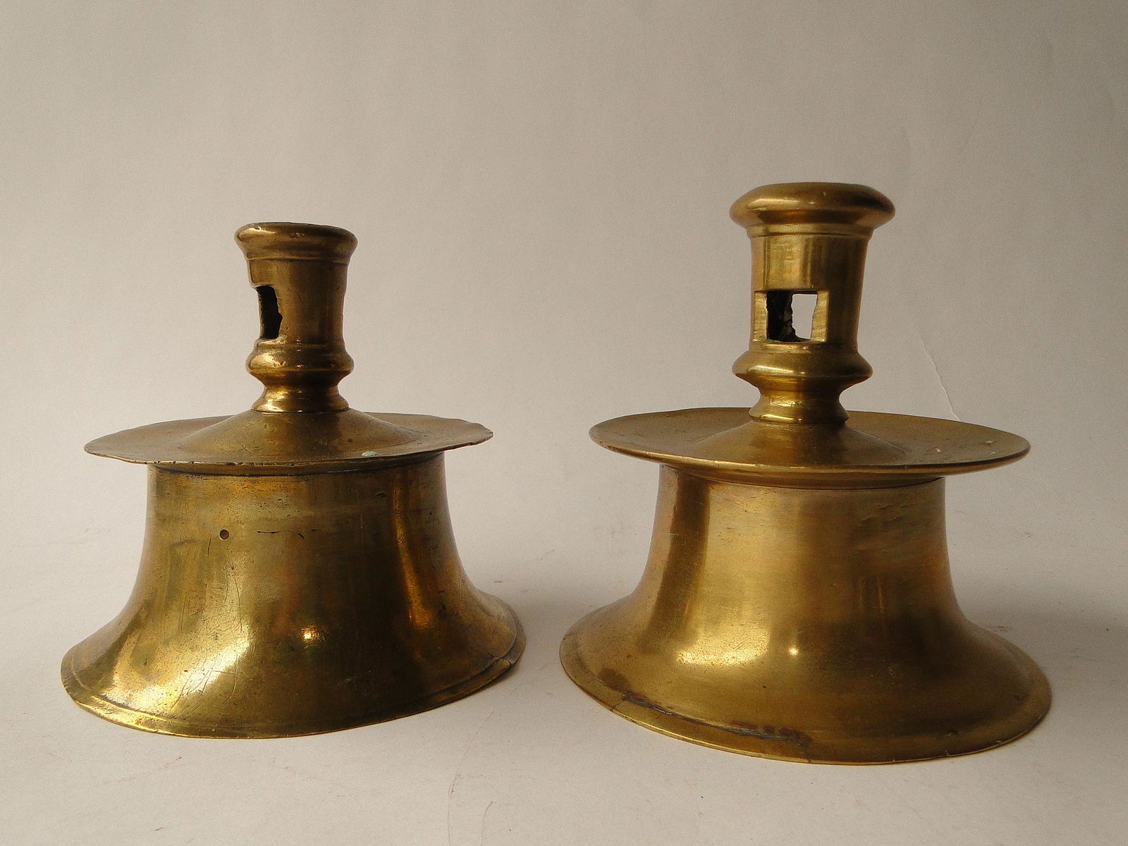 NEAR PAIR EARLY BRASS CAPSTAN CANDLESTICKS (1 of 3)