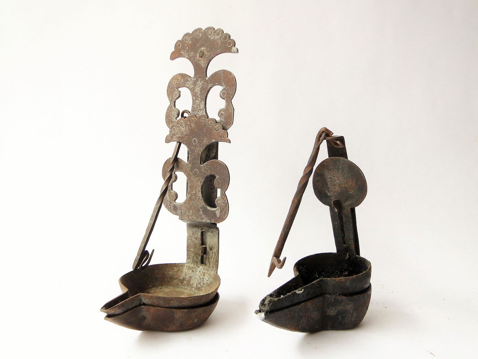 TWO IRON DOUBLE GREASE LIGHTS (1 of 2)