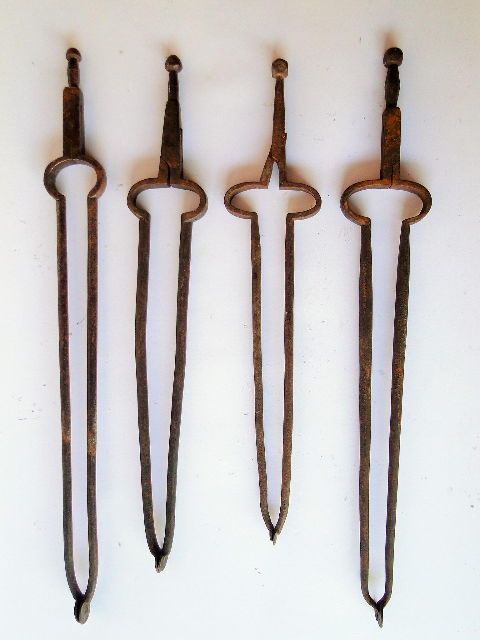 FOUR 18TH C IRON FIRE TONGS (1 of 1)