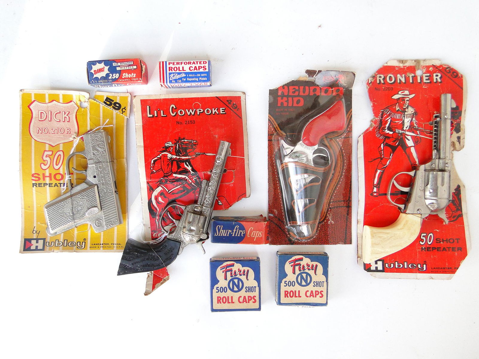 GROUPING OF VINTAGE CAP GUNS: GROUPING OF VINTAGE CAP GUNS, NEW OLD STOCK