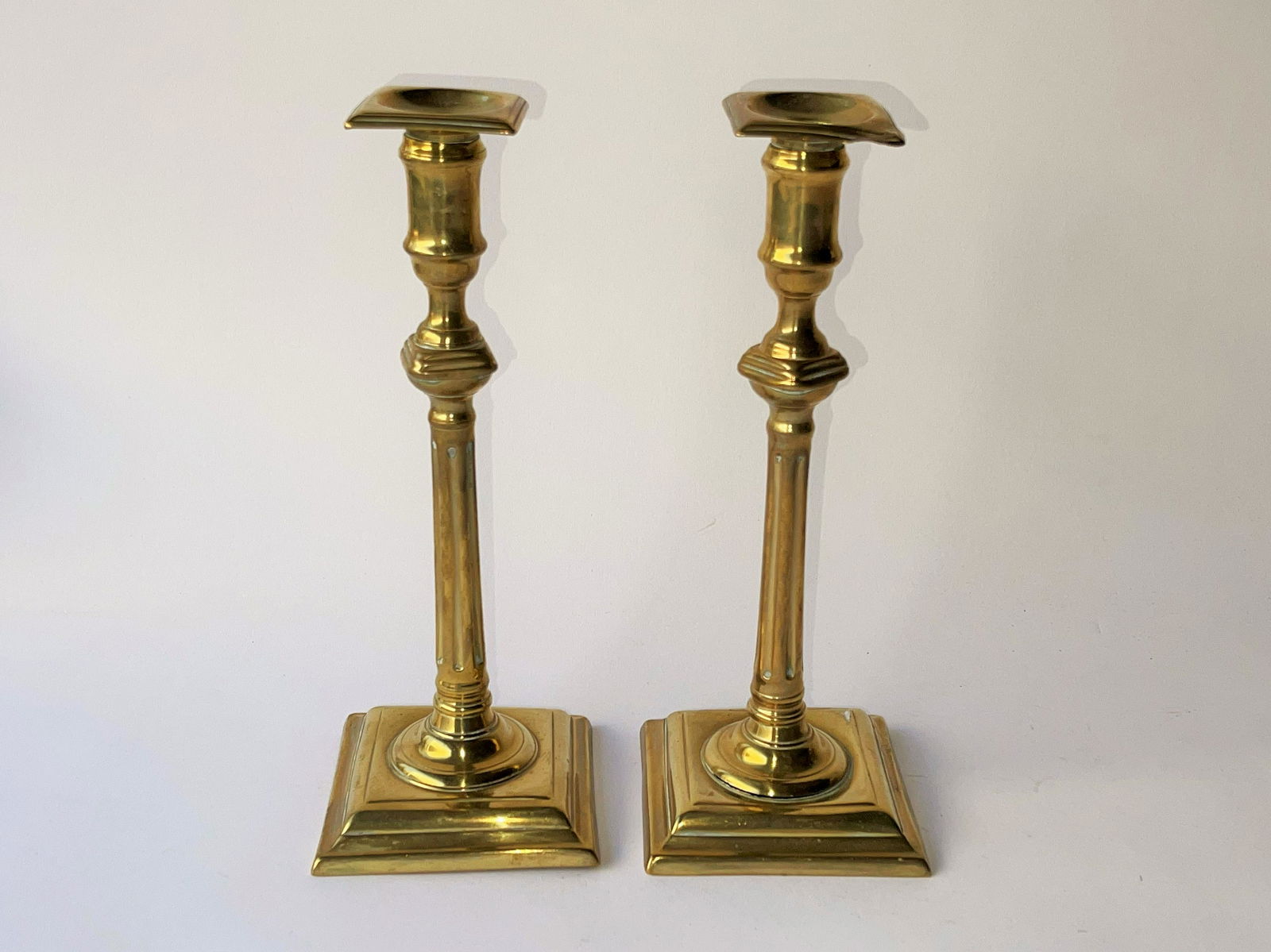 MID 18TH C PAIR OF FORMAL ENGLISH BRASS CANDLESTICKS (1 of 3)