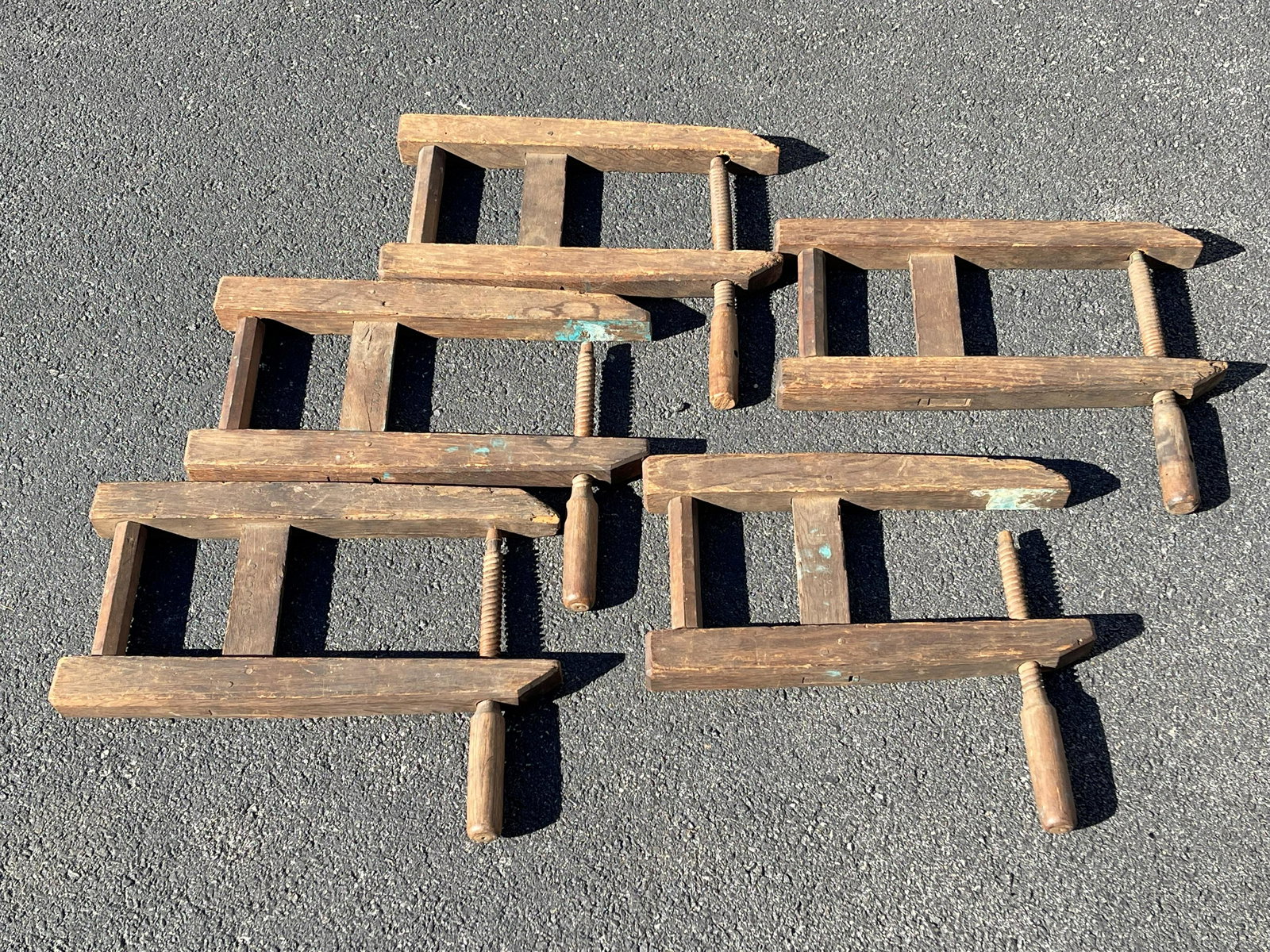 SET OF FOUR WOODEN CLAMPS SIGNED (1 of 2)
