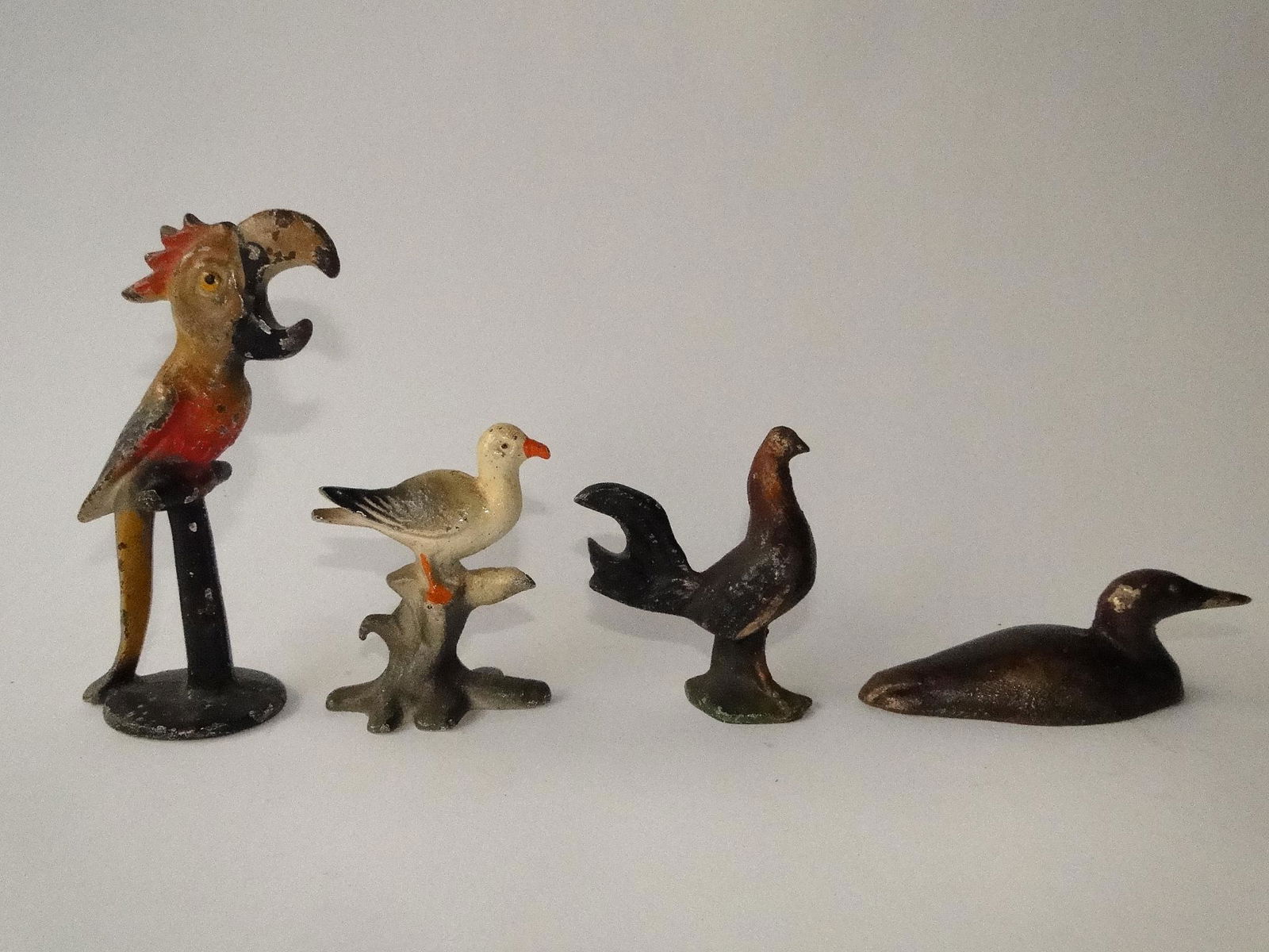 GROUPING OF CAST IRON FIGURAL BOTTLE OPENERS (1 of 2)