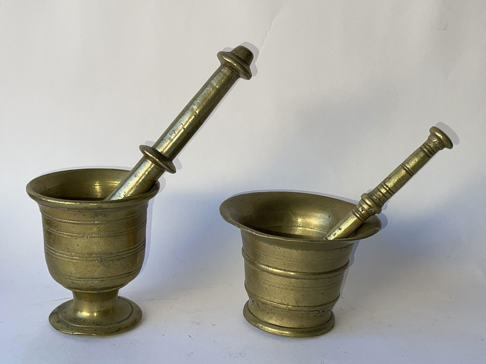 TWO SMALL BRASS MORTAR AND PESTLES (1 of 2)