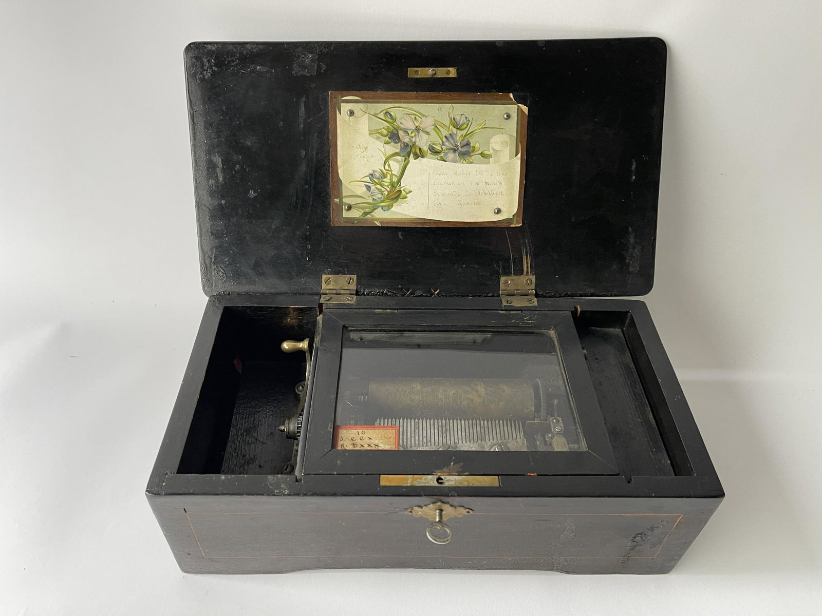 EARLY 19TH C FRENCH /SWISS MADE MUSIC BOX: EARLY 19TH C FRENCH /SWISS MADE MUSIC BOX, GOOD TUNE, FOUR TUNES, ALL TEETH INTACT, HOLDS A TUNE VERY WELL, 4.75 X 13.25 X 7.25 D