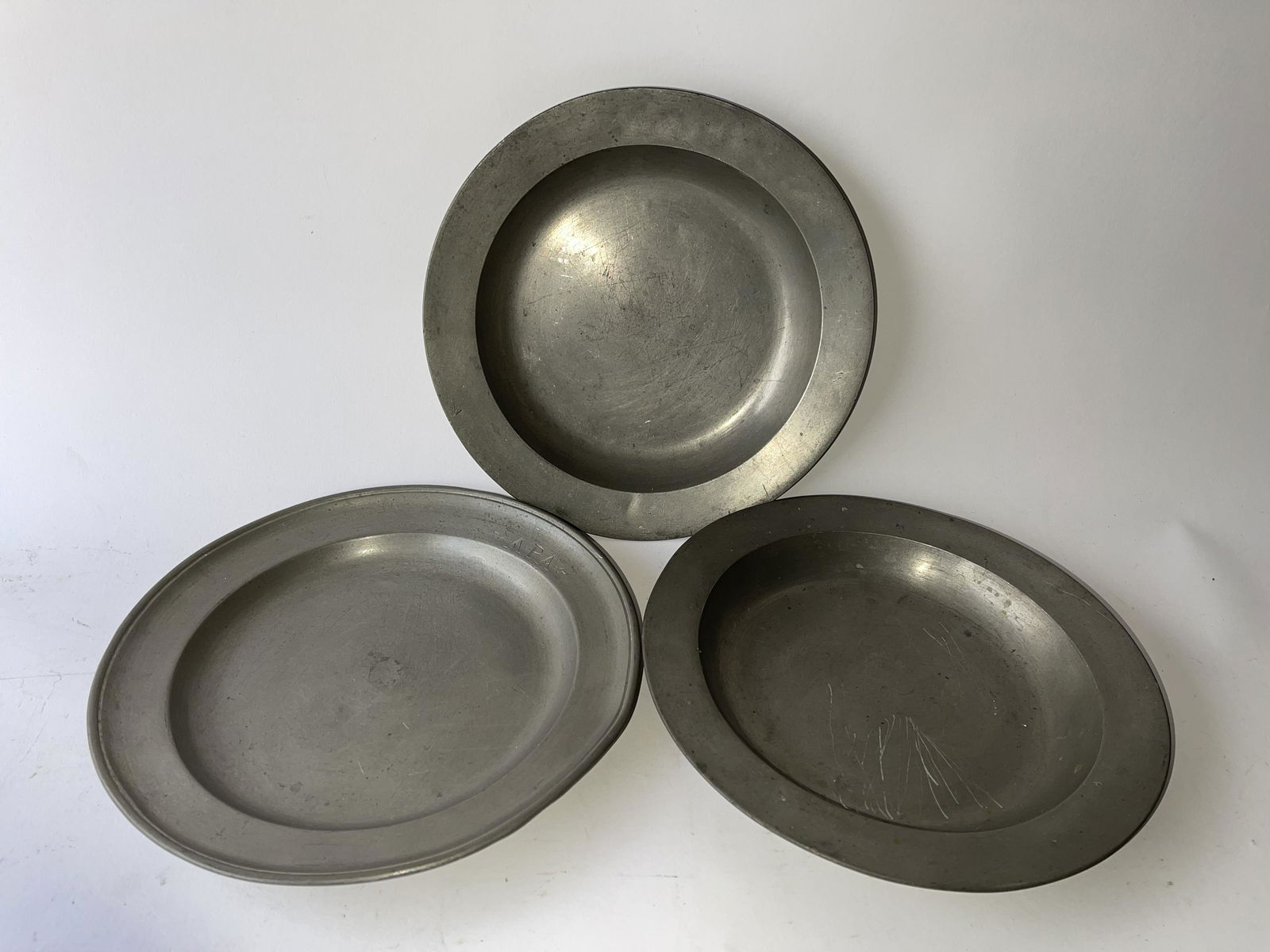 GROUPING OF THREE PEWTER PLATES (1 of 5)
