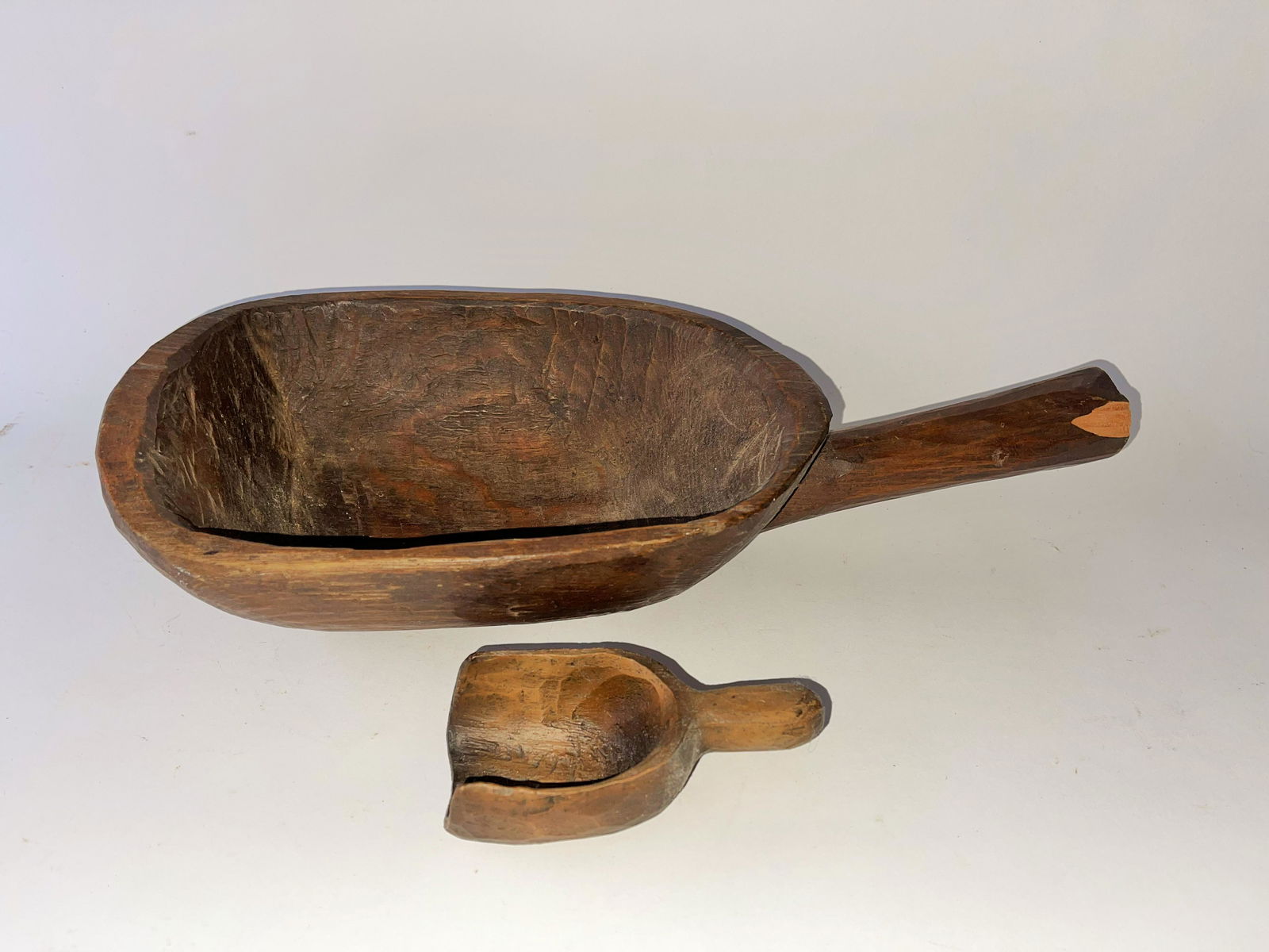 TWO PRIMITIVE WOODEN SCOOPS (1 of 3)