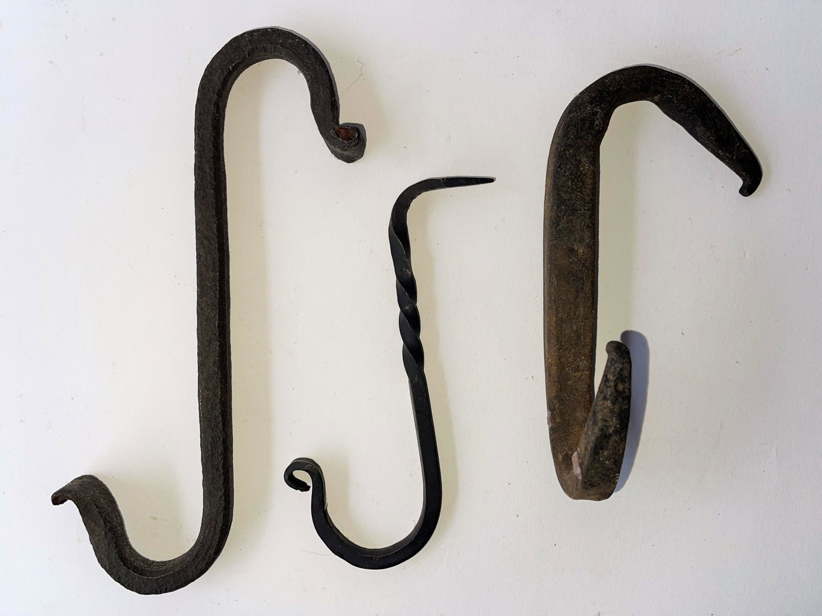 GROUPING OF THREE IRON S HOOKS FOR FIREPLACE: GROUPING OF THREE IRON S HOOKS FOR FIREPLACE 4", 8"