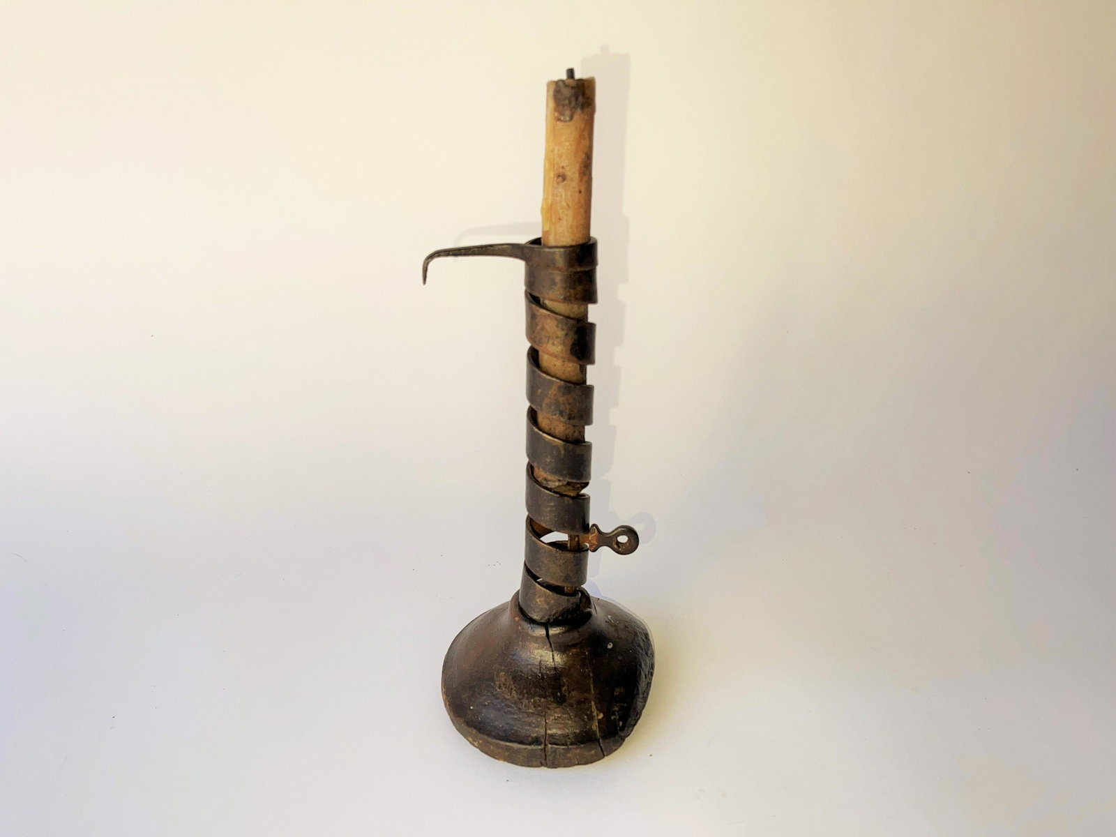 18TH C SPIRAL CANDLESTICK ON WOOD BASE (1 of 2)