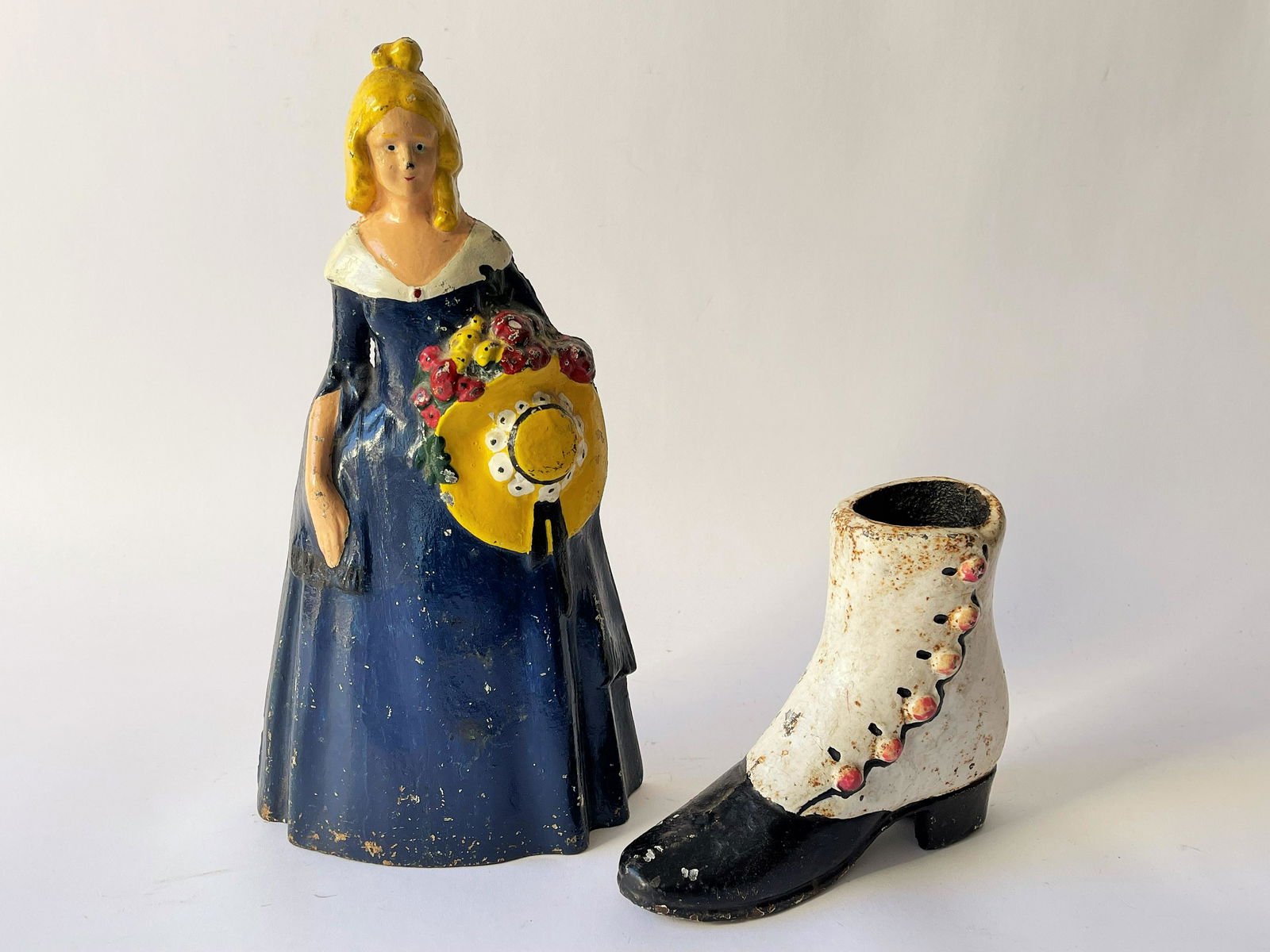 TWO IRON PAINTED DOORSTOPS: TWO IRON PAINTED DOORSTOPS, LADY, BOOT