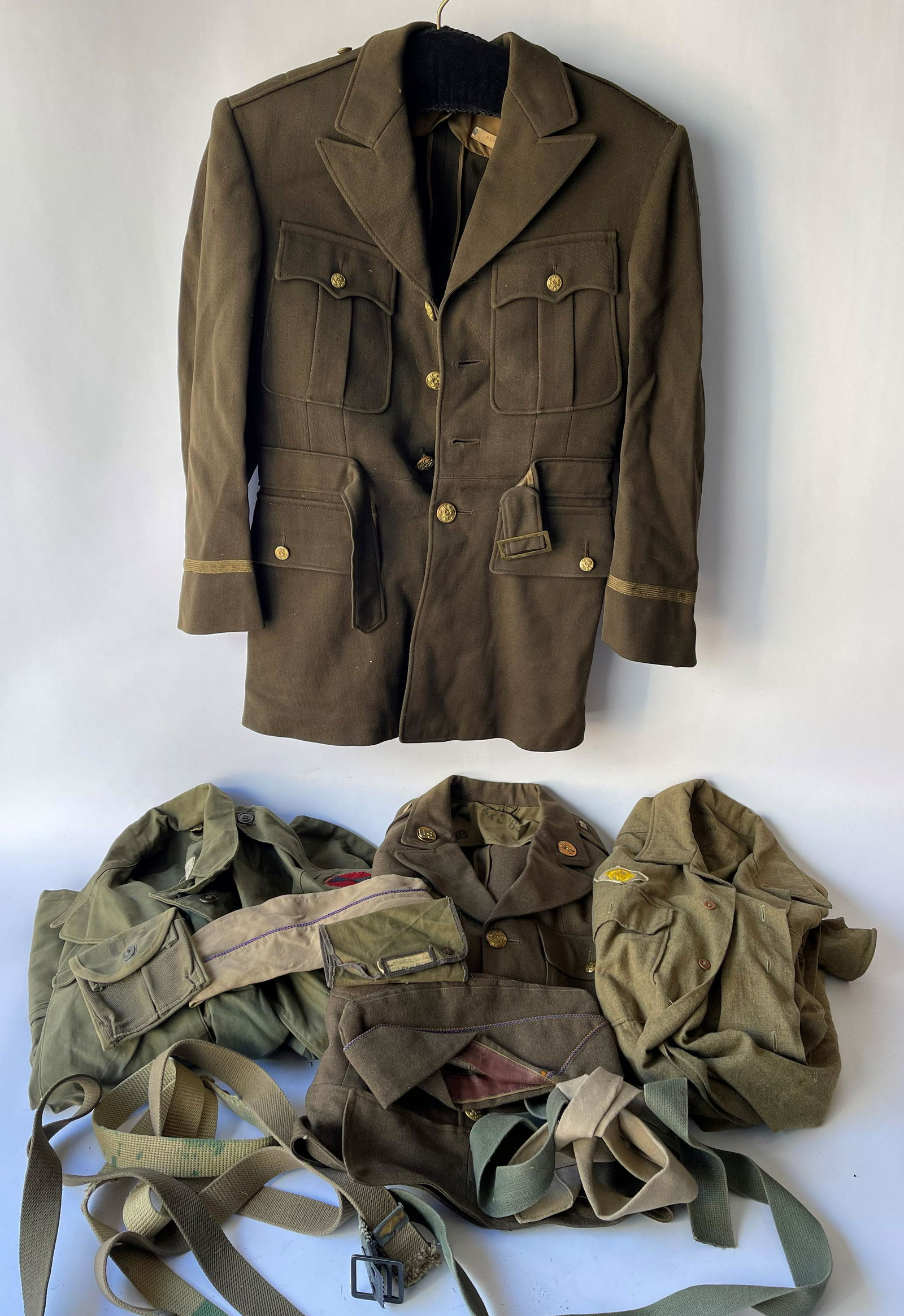 GROUPING OF MILITARY JACKETS, HATS, BELTS, ETC. (1 of 3)