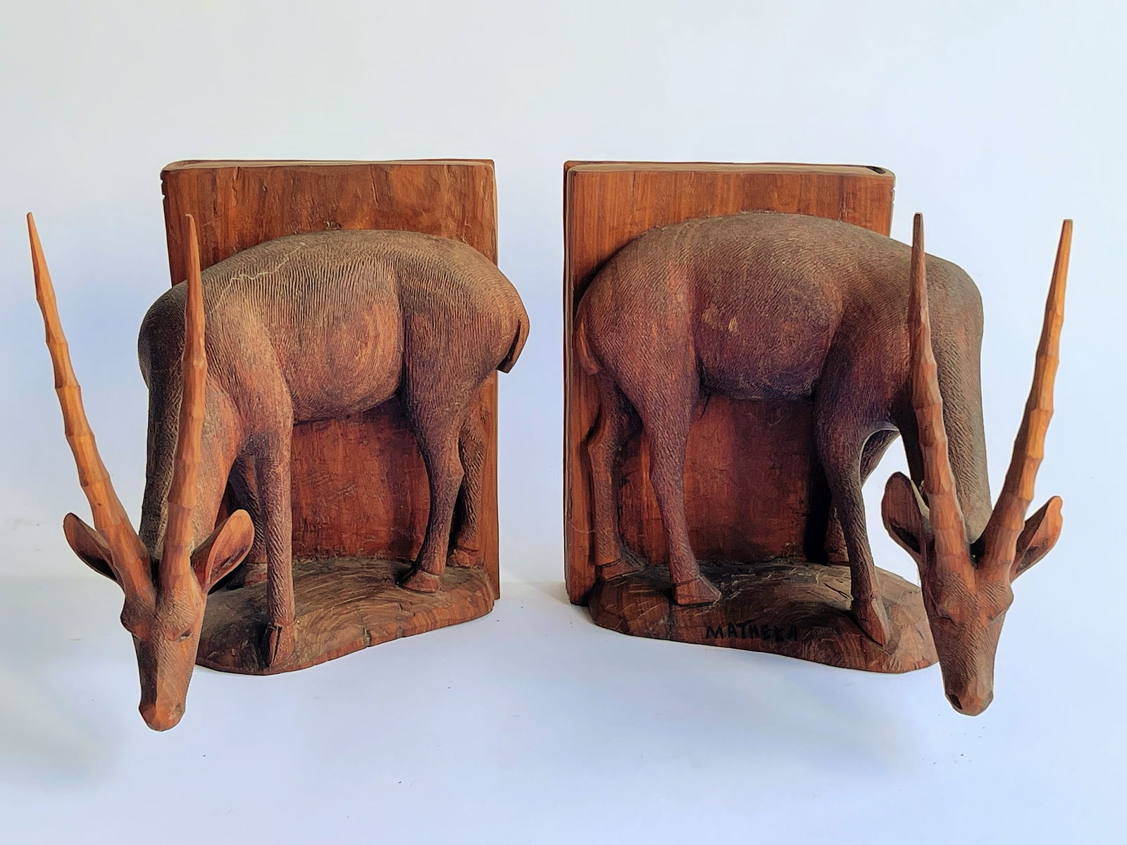 CARVED ANTELOPES BOOKENDS SIGNED MATHAKA (1 of 3)