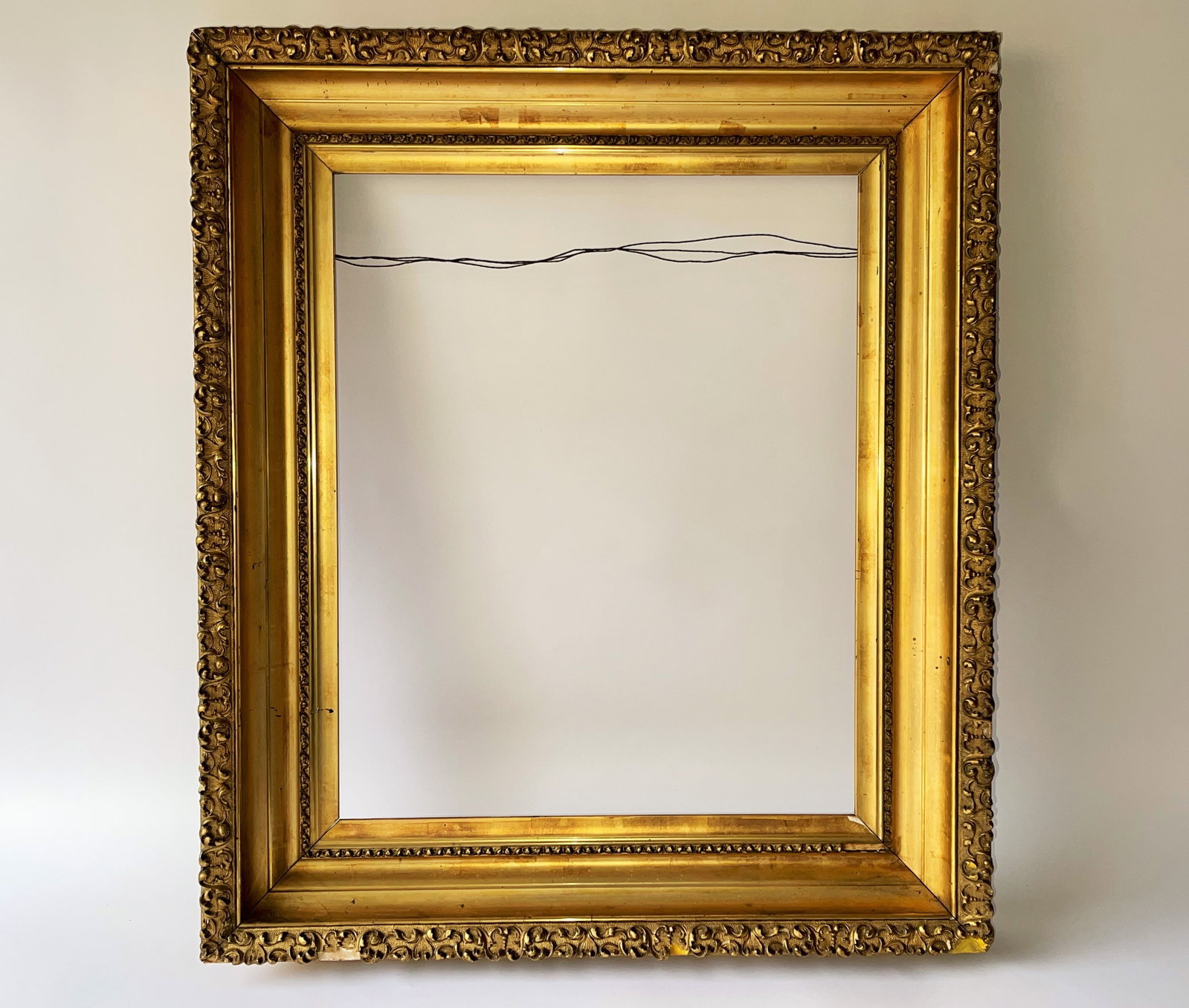 GOLD PICTURE FRAME: GOLD PICTURE FRAME, 25 X 29 SOME PIECES MISSING