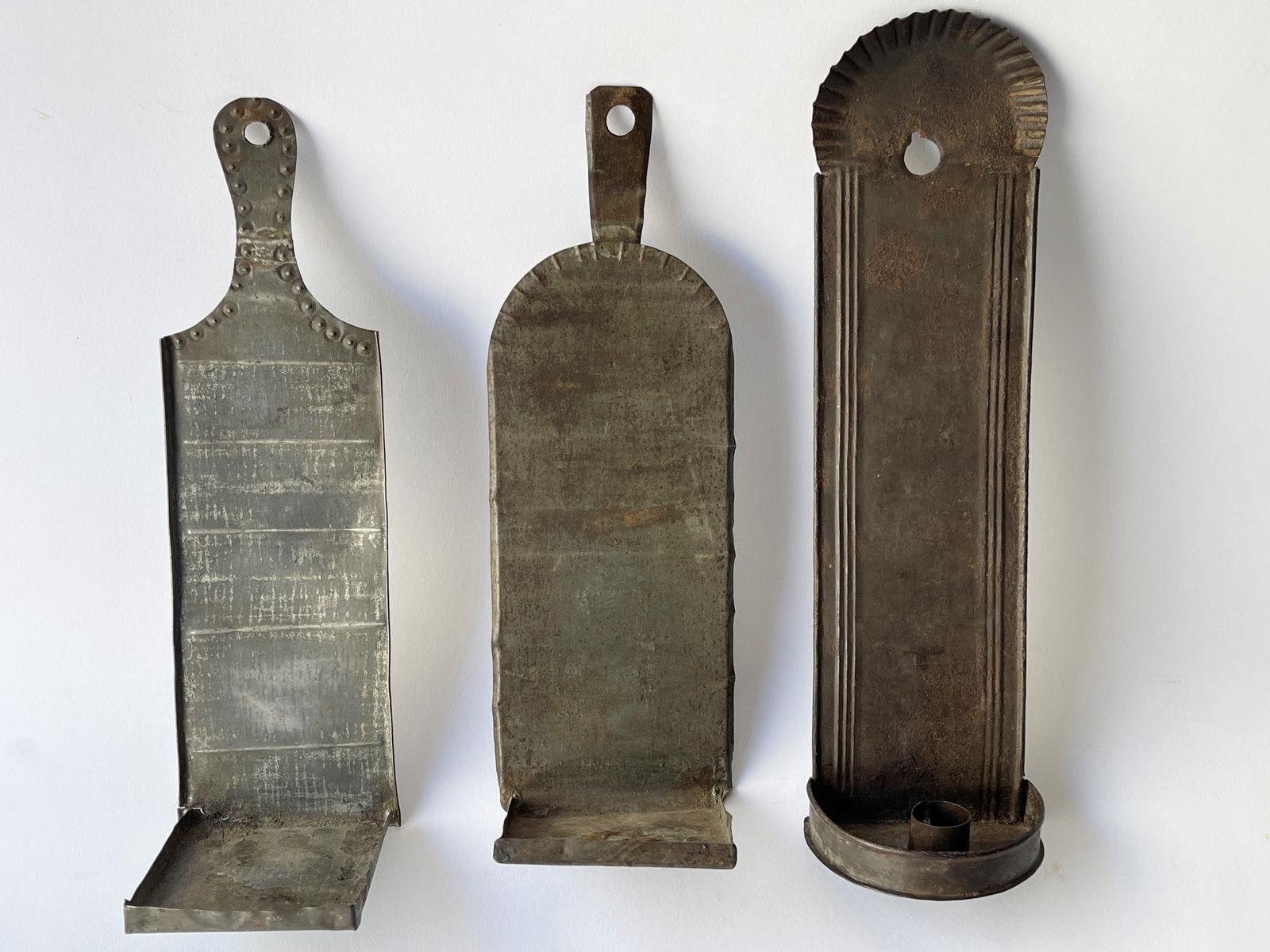 GROUPING OF THREE EARLY TIN SCONCES (1 of 2)