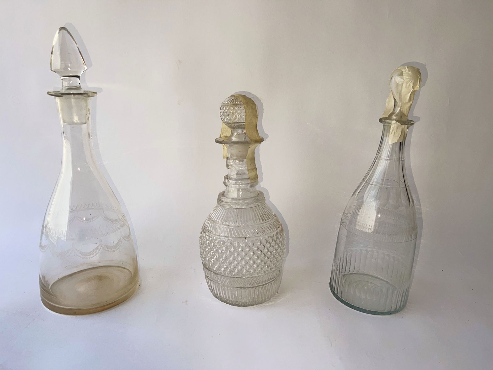 THREE GLASS DECANTERS (1 of 2)