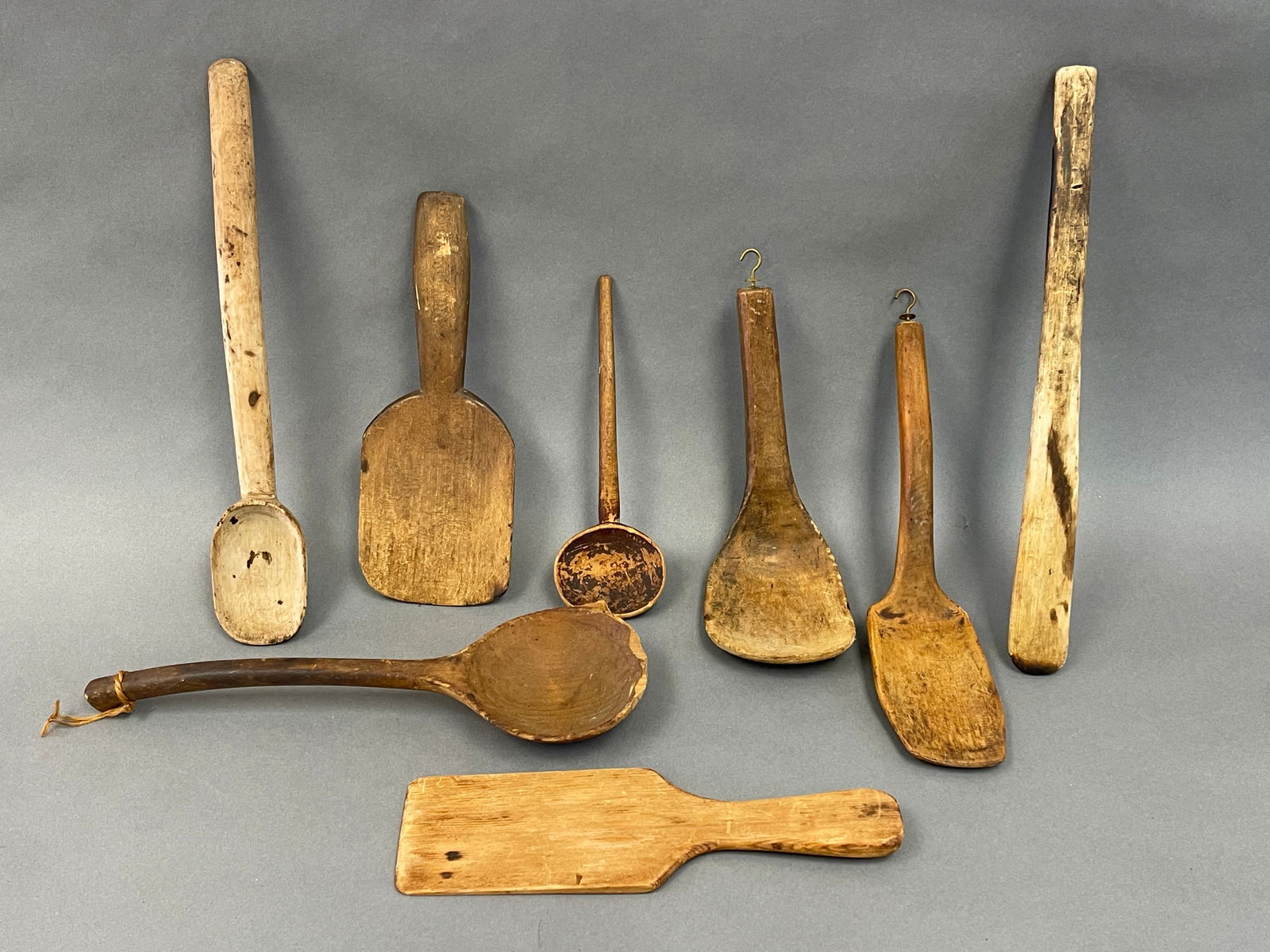 GROUPING OF PRIMITIVE WOODEN UTENSILS (1 of 2)