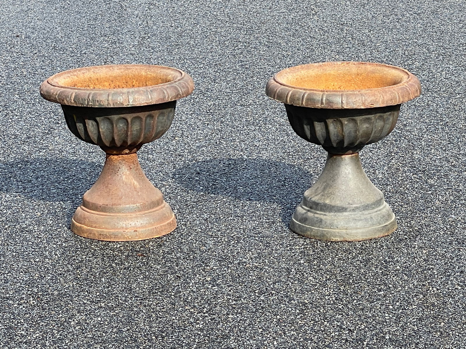 PAIR OF CAST IRON FLOWER POTS (1 of 2)