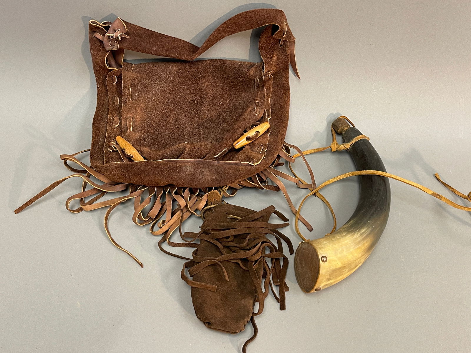 POWDERHORN ,TWO LEATHER BEADED POUCHES (1 of 1)