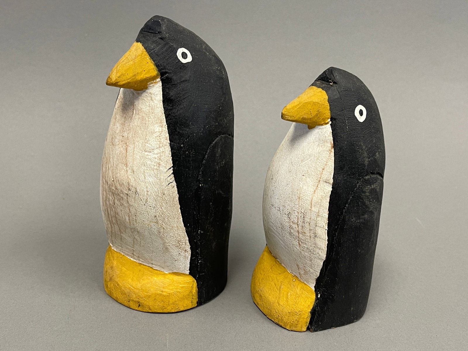 TWO PAINTED WOODEN CARVED PENGUINS: TWO PAINTED WOODEN CARVED PENGUINS 5.5" , 6"