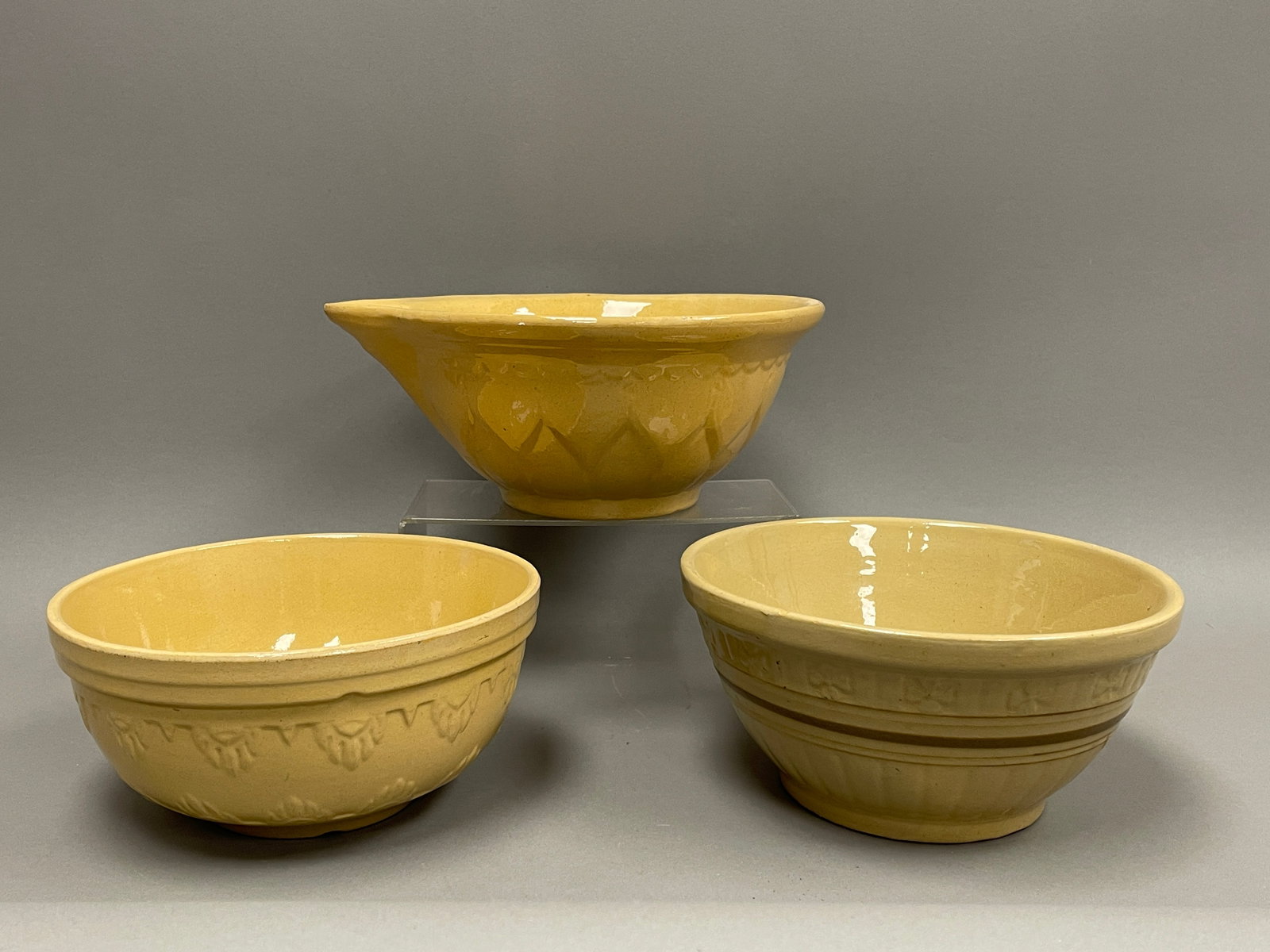 GROUPING OF THREE YELLOW WARE BOWL (1 of 3)