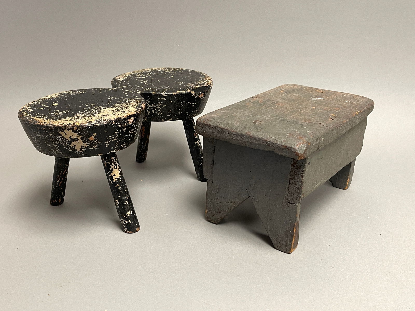 TWO EARLY PAINTED STOOLS (1 of 2)