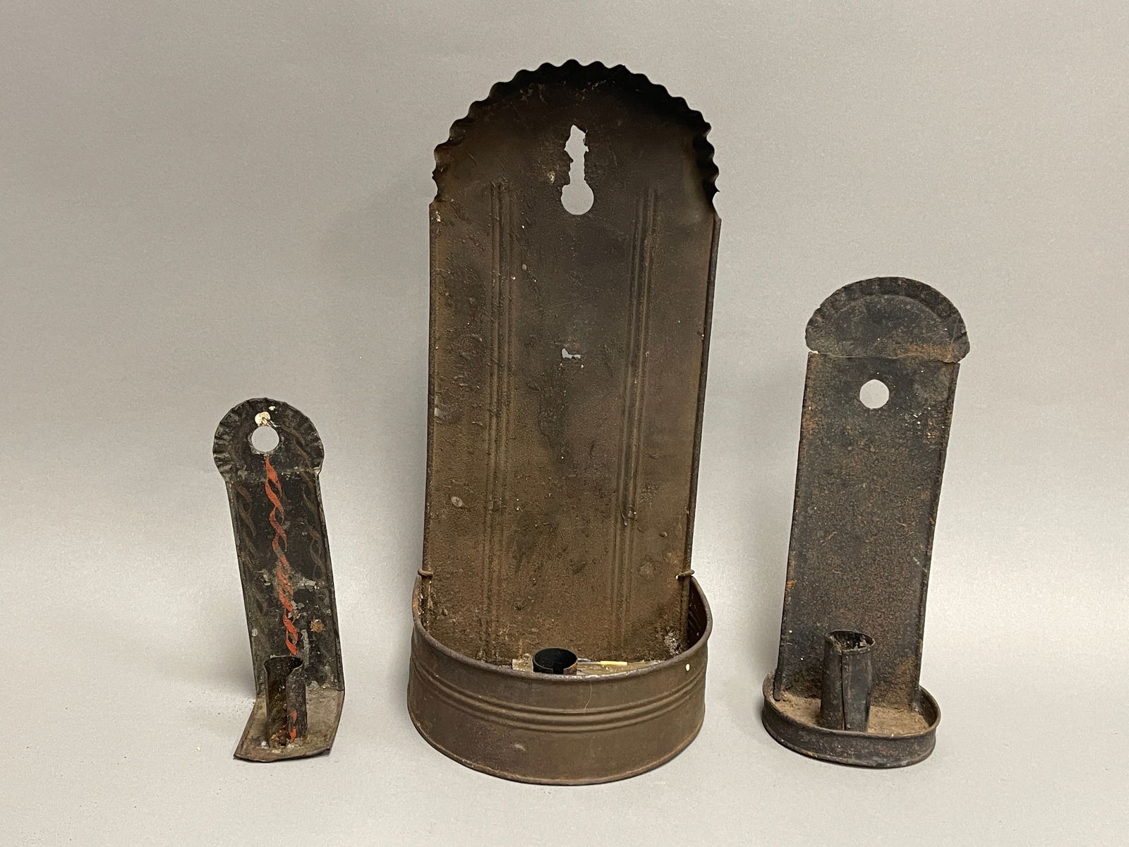 THREE EARLY TIN SCONCES (1 of 4)