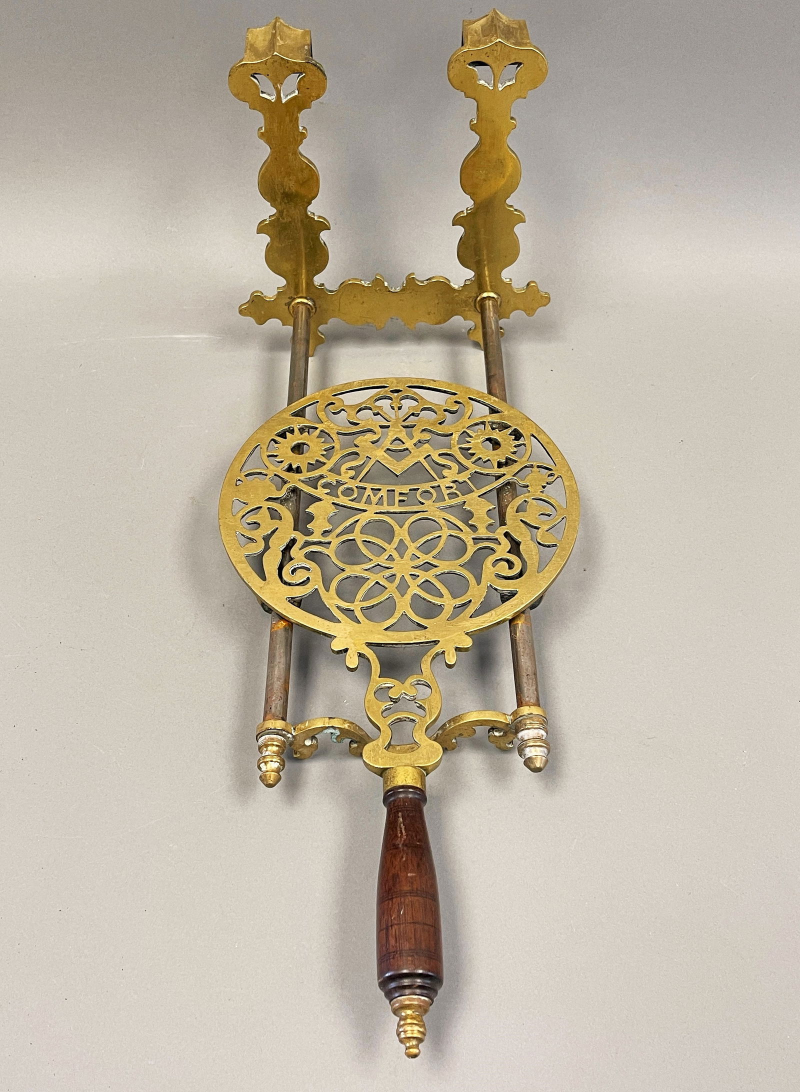 19TH C. ADJUSTABLE HANDLED BRASS FIREPLACE FENDER TRIVET W/ MASONIC MOTIF & COMFORT (1 of 4)
