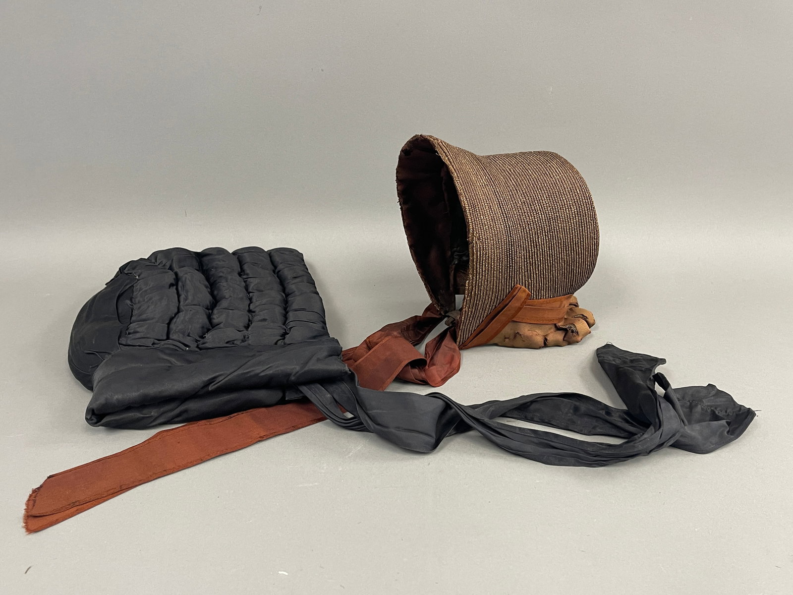 CIVIL WAR ERA STRAW BONNET: CIVIL WAR ERA STRAW BONNET W/ OWNERS NAME SEWIN & 1905 BLACK QUILTED BONNET HANNAH DUSTIN BRAND HOOKER AND HOW