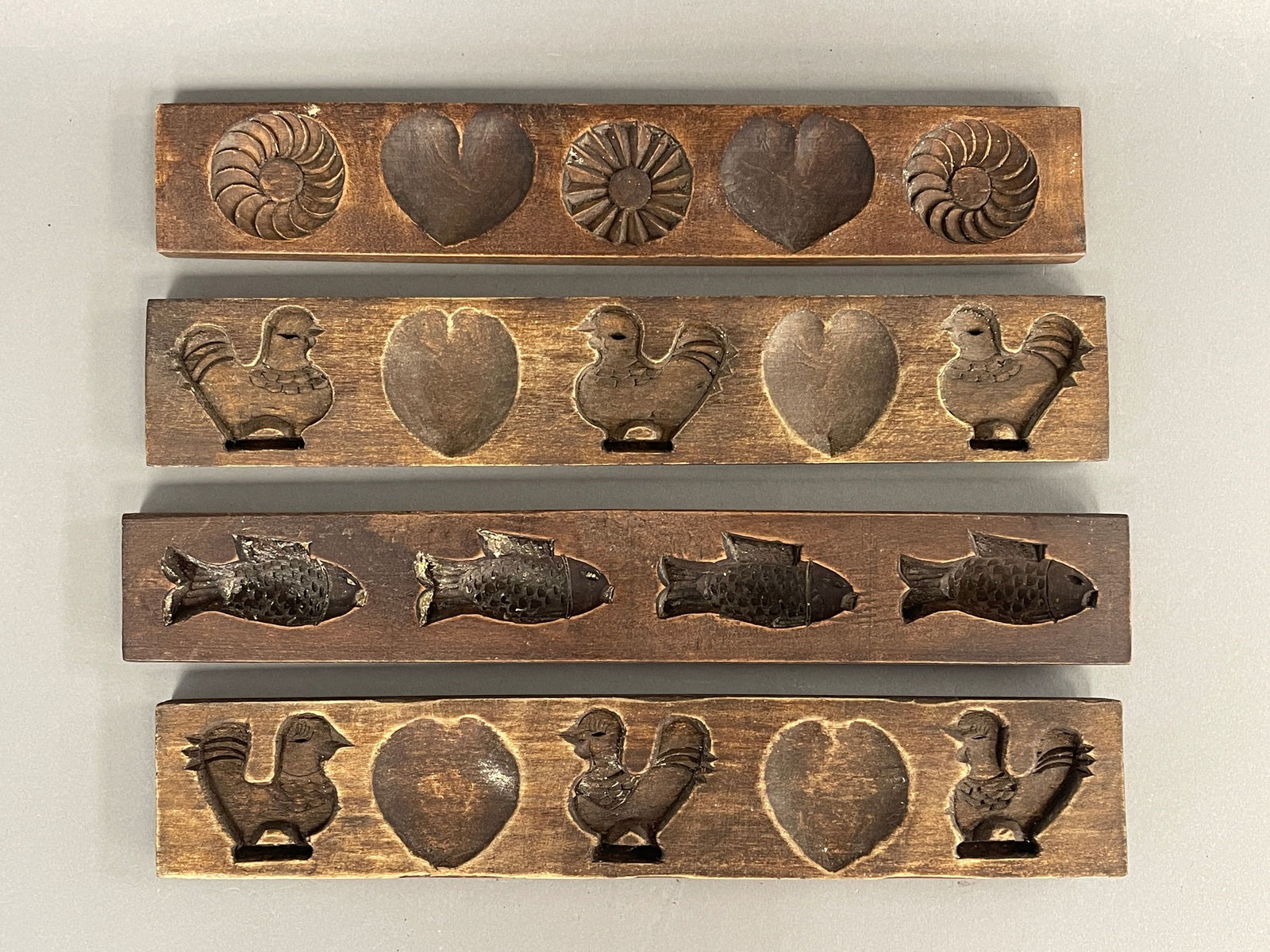 FOUR CARVED WOOD MAPLE SUGAR CANDY MOULDS (1 of 2)