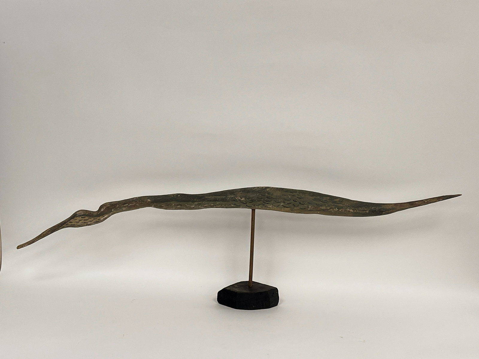 EARLY FOLK CARVED WOODEN FLYING HERON IN THE OLD GREEN WITH STYLIZED PAINTED FEATHERS: EARLY FOLK CARVED WOODEN FLYING HERON IN THE OLD GREEN WITH STYLIZED PAINTED FEATHERS 48 X 13