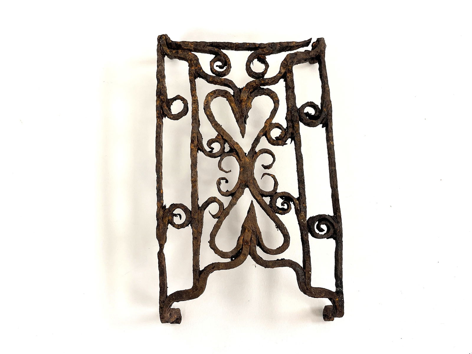 EARLY SMALL RECTANGULAR HAND FORGED FOOTED FANCY IRON TRIVET (1 of 2)
