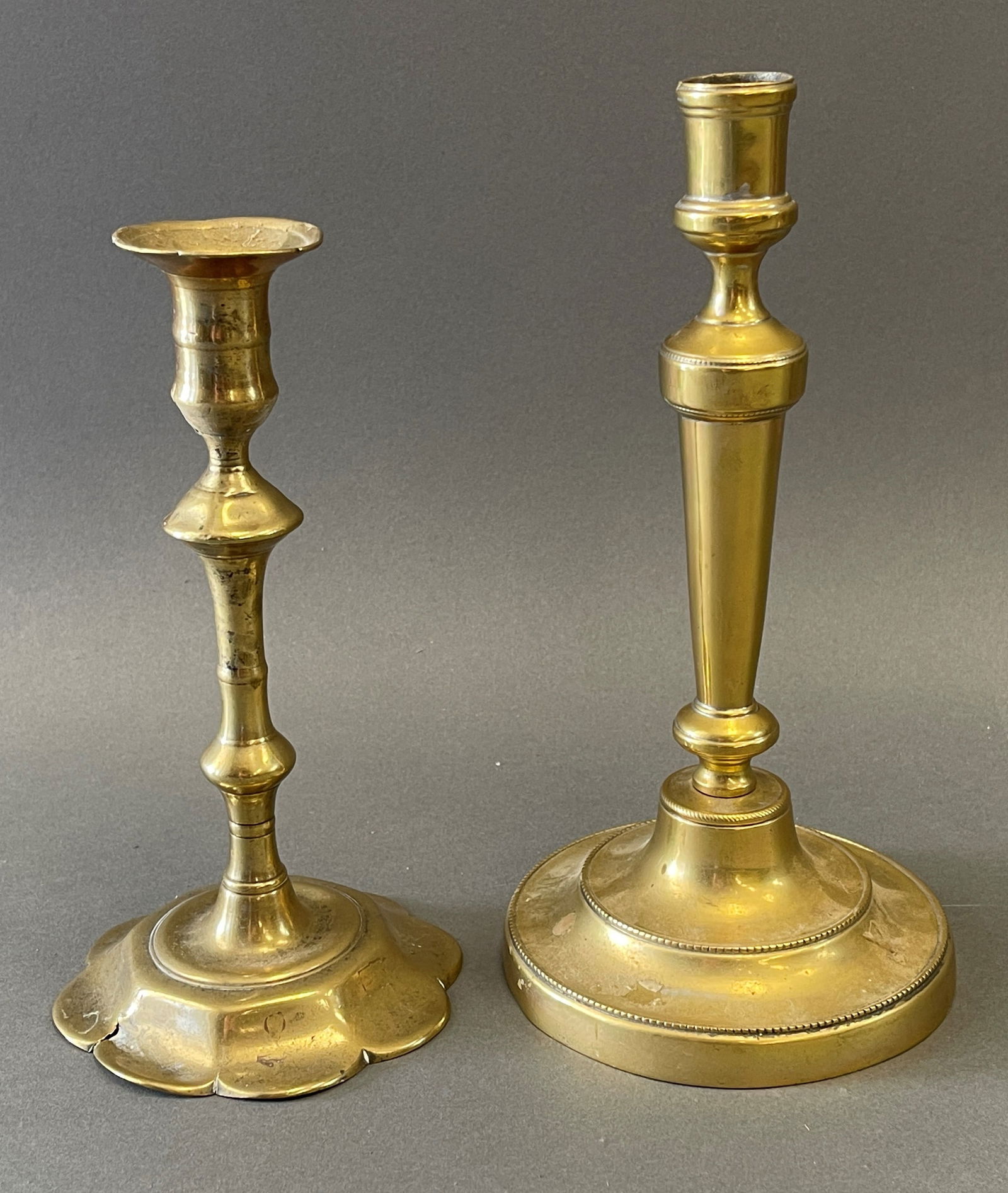 TWO 18TH C BRASS CANDLESTICKS (1 of 2)