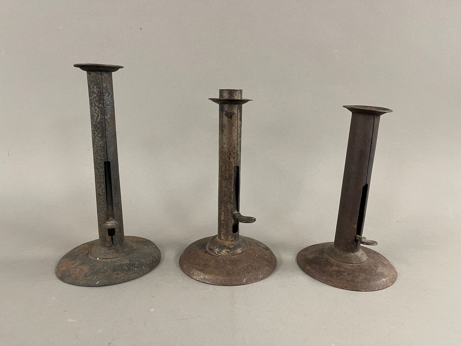 THREE HOGSCRAPER PUSH UP CANDLESTICKS (1 of 3)