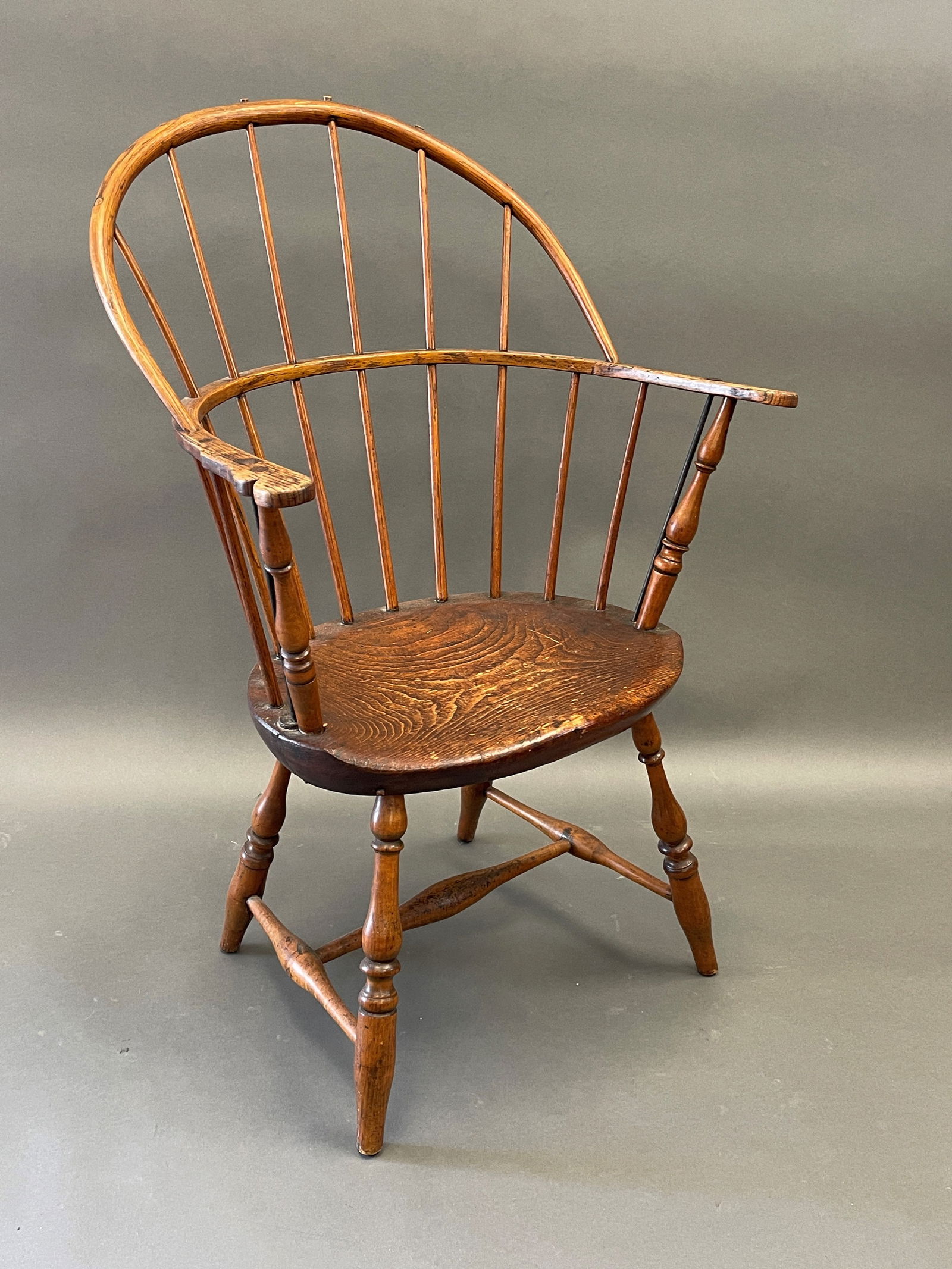 EARLY TEN SPINDLE BOW BACK ARM CHAIR (1 of 3)