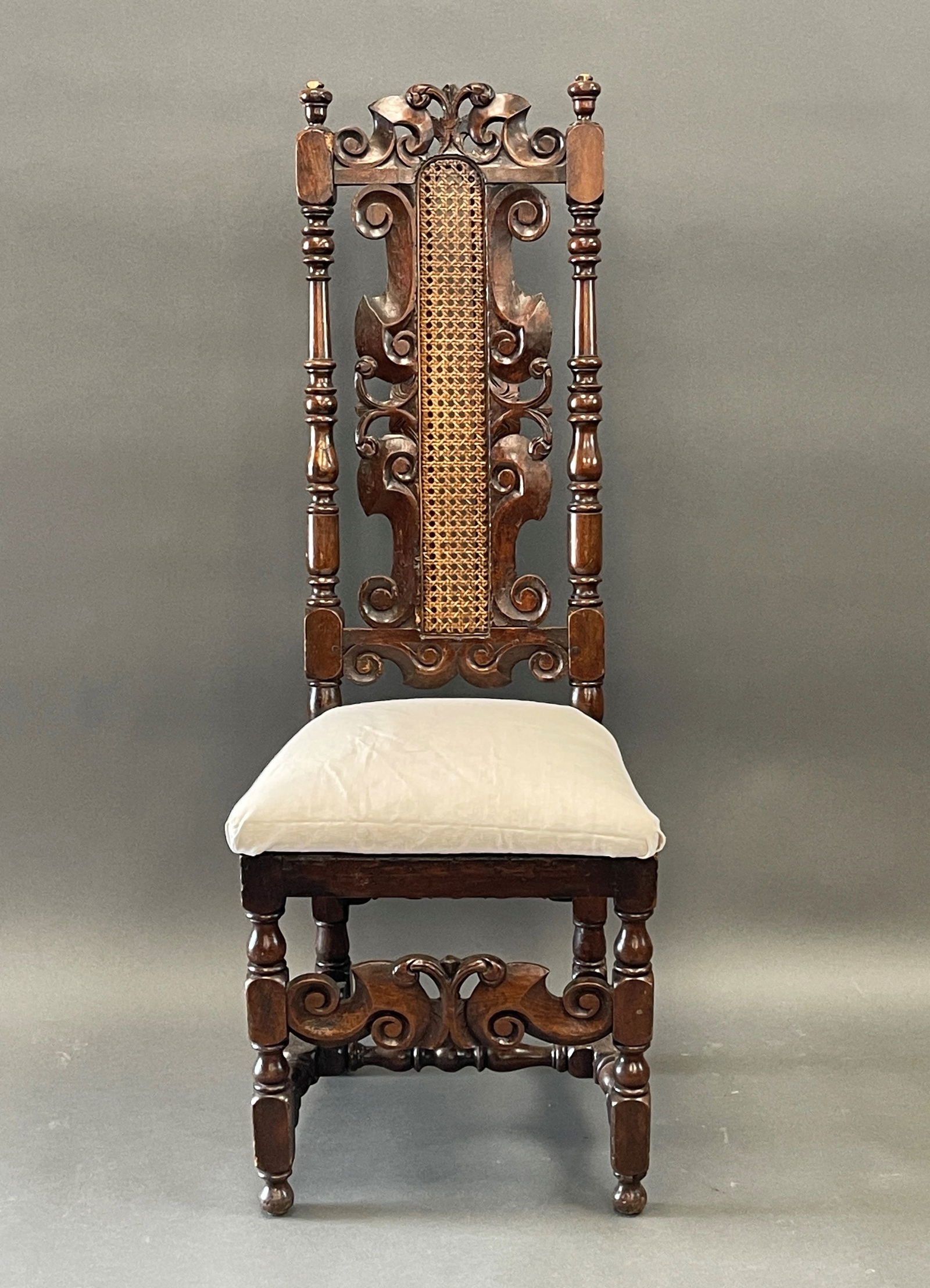 CARVED WALNUT CANE BACK CHAIR WITH UPHOLSTERED SEAT 1680-1700 (1 of 4)