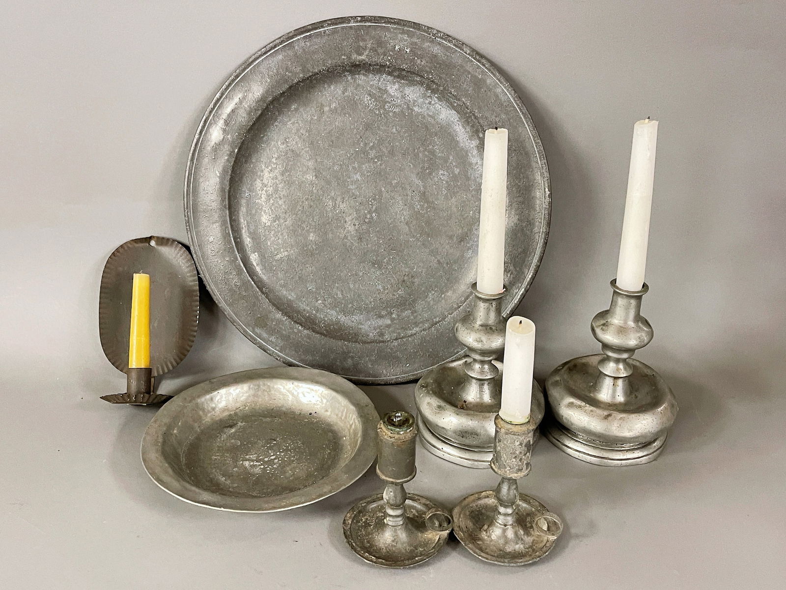 PEWTER LOT TO INCLUDE LARGE CHARGER , PAIR OF CANDLESTICKS,TWO SMALL LAMPS , BOWL (1 of 4)