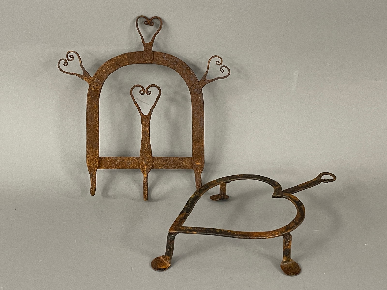 TWO HEARTED DECORATED IRON ITEMS TRIVET , SMALL UTENSIL RACK: TWO HEARTED DECORATED IRON ITEMS TRIVET 5" X 9" , SMALL UTENSIL RACK 9" X 9"
