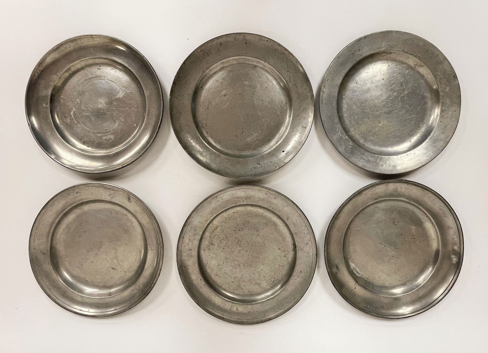 SIX EARLY PEWTER PLATES (1 of 5)