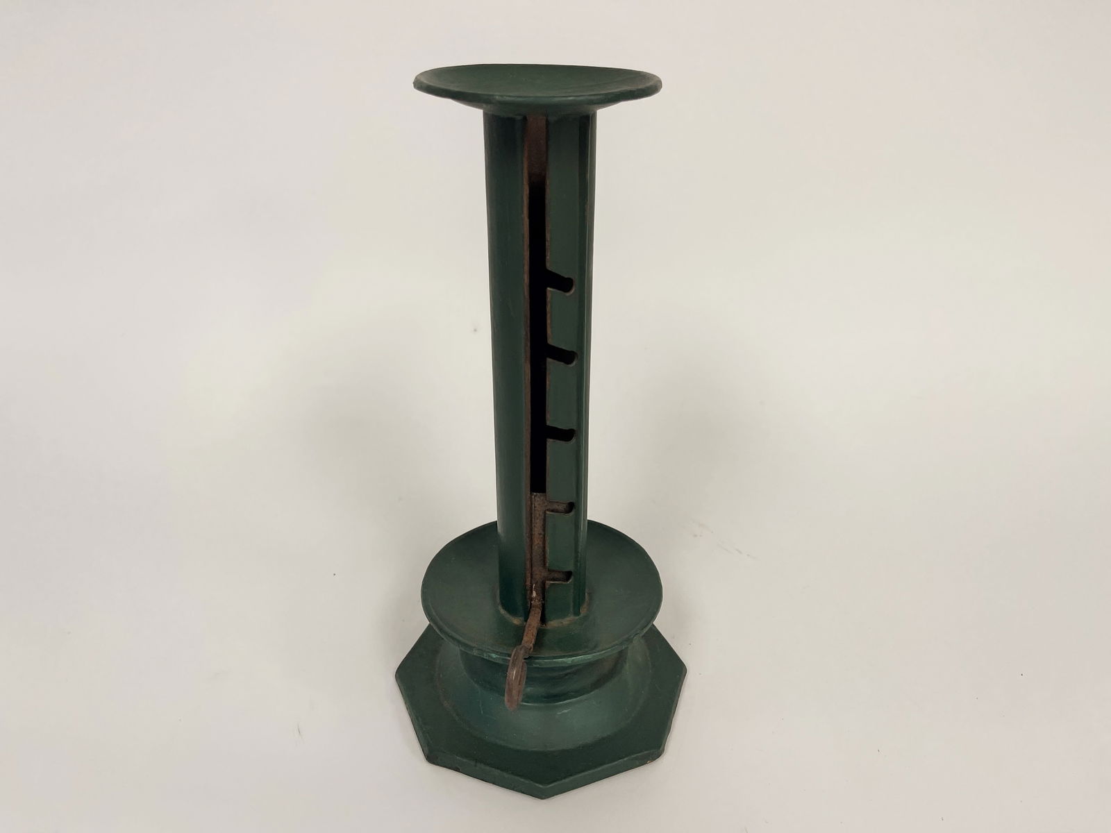 GREEN PAINTED PUSH UP CANDLESTICK: GREEN PAINTED PUSH UP CANDLESTICK SAND WEIGHTED BASE TIN PUSH UP 12"