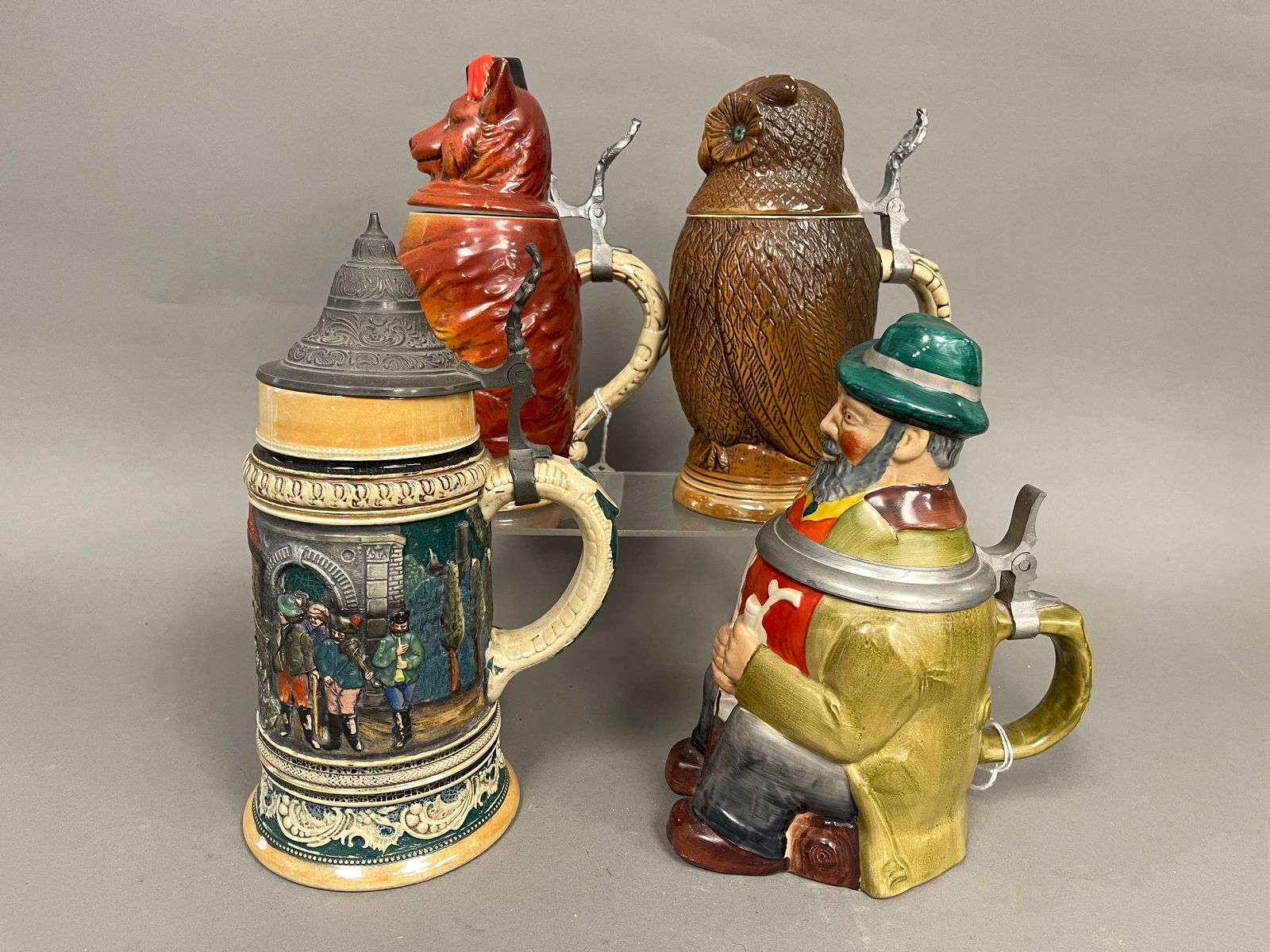 GROUPING OF FOUR GERMAN STEINS (1 of 5)