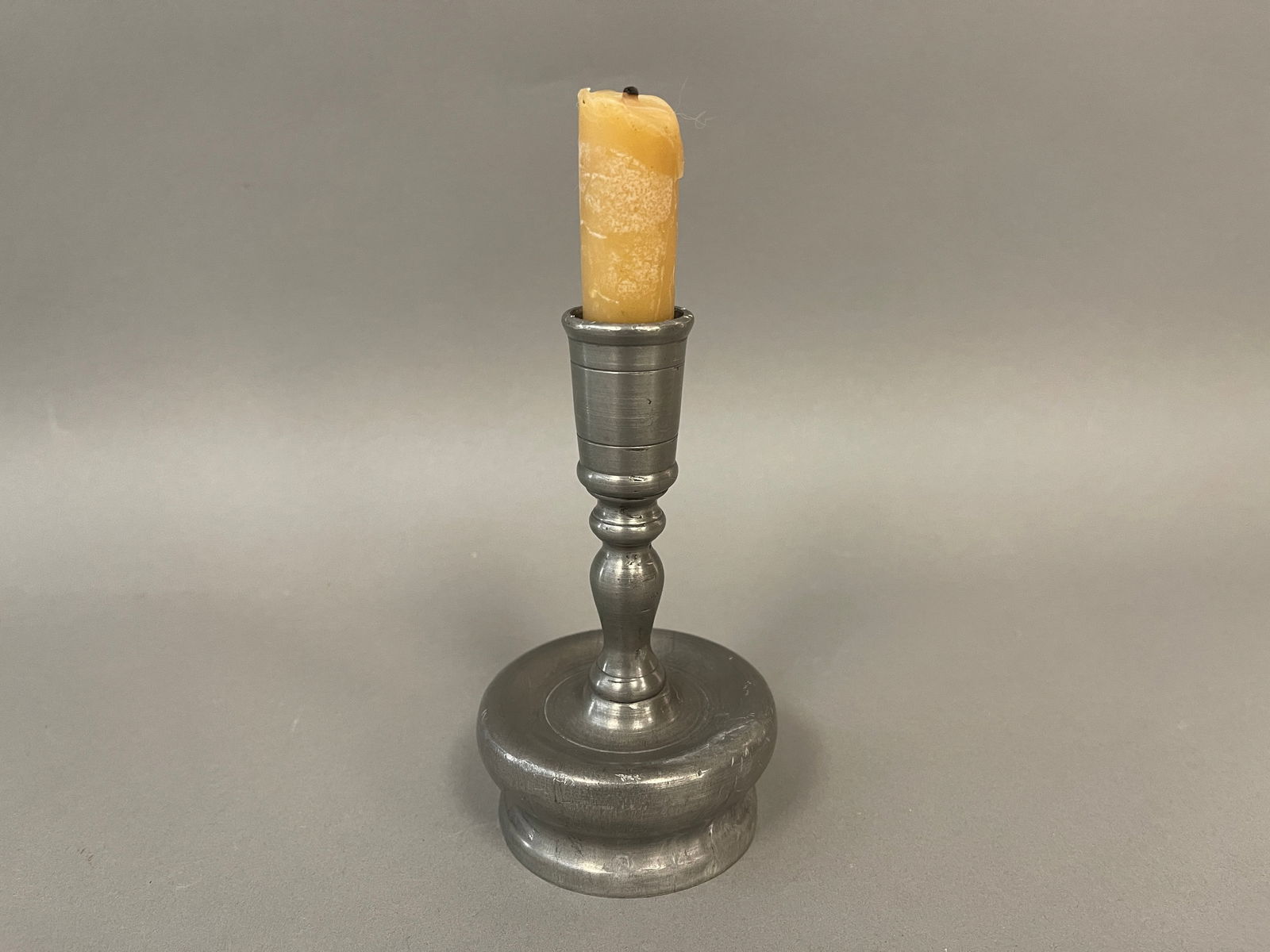 18TH C PEWTER CANDLESTICK IN BULBOUS FORM (1 of 3)