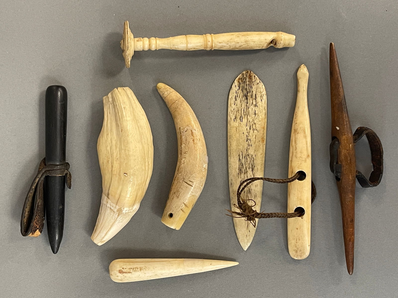 LOT OF 8 AMERICAN 19TH C SAILOR MADE BONE: LOT OF 8 AMERICAN 19TH C SAILOR MADE BONE ITEMS:AMERICAN. 19TH C 8 PCS ½” CARVED BONE WHISTLE, 2¾” CARVED BONE MINI FID OR BODKIN, 4” FLAT CARVED BONE LETTER OPENER, 4&