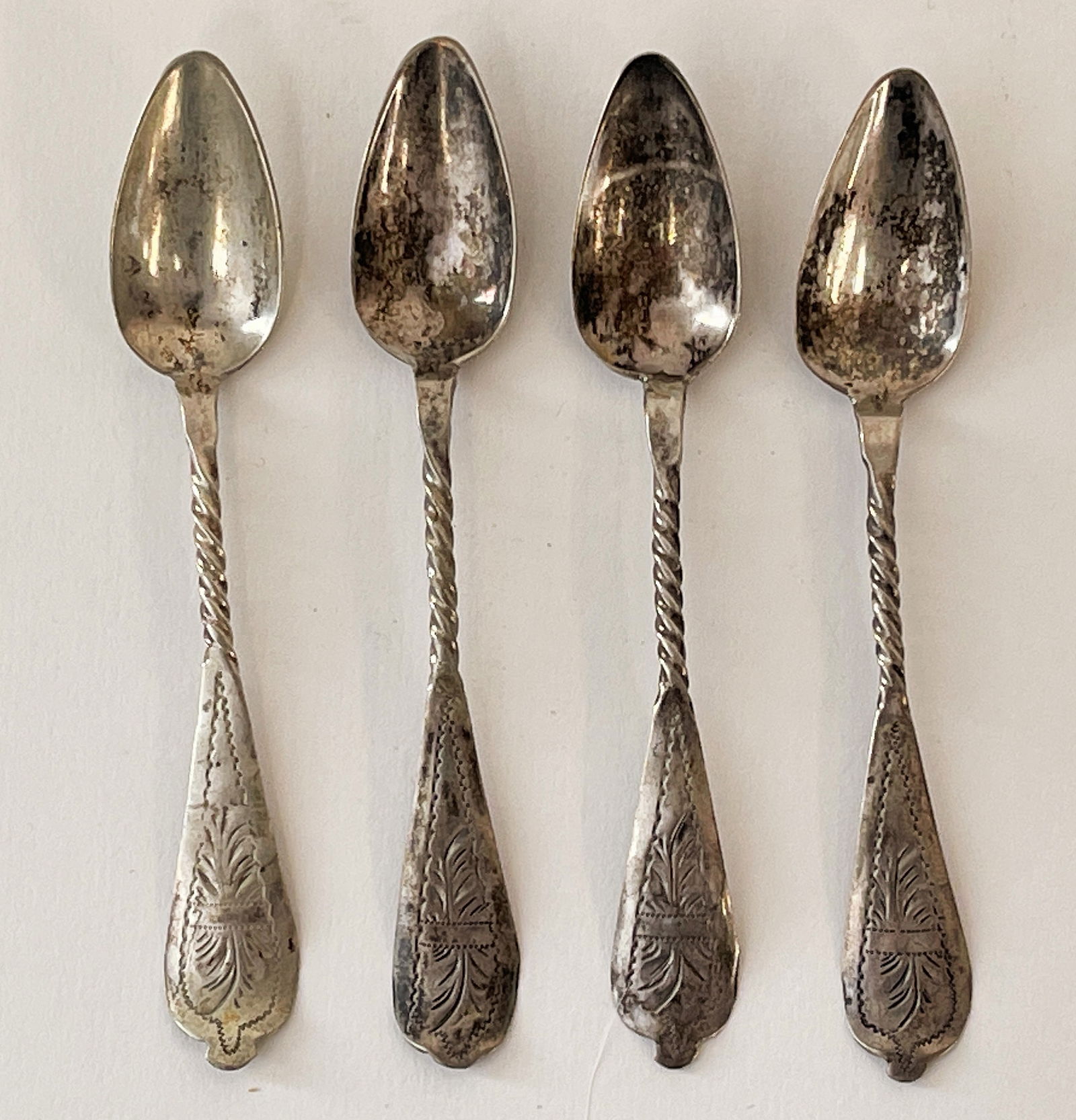 SET OF FOUR 17TH C DEMITASSE SPOONS (1 of 3)