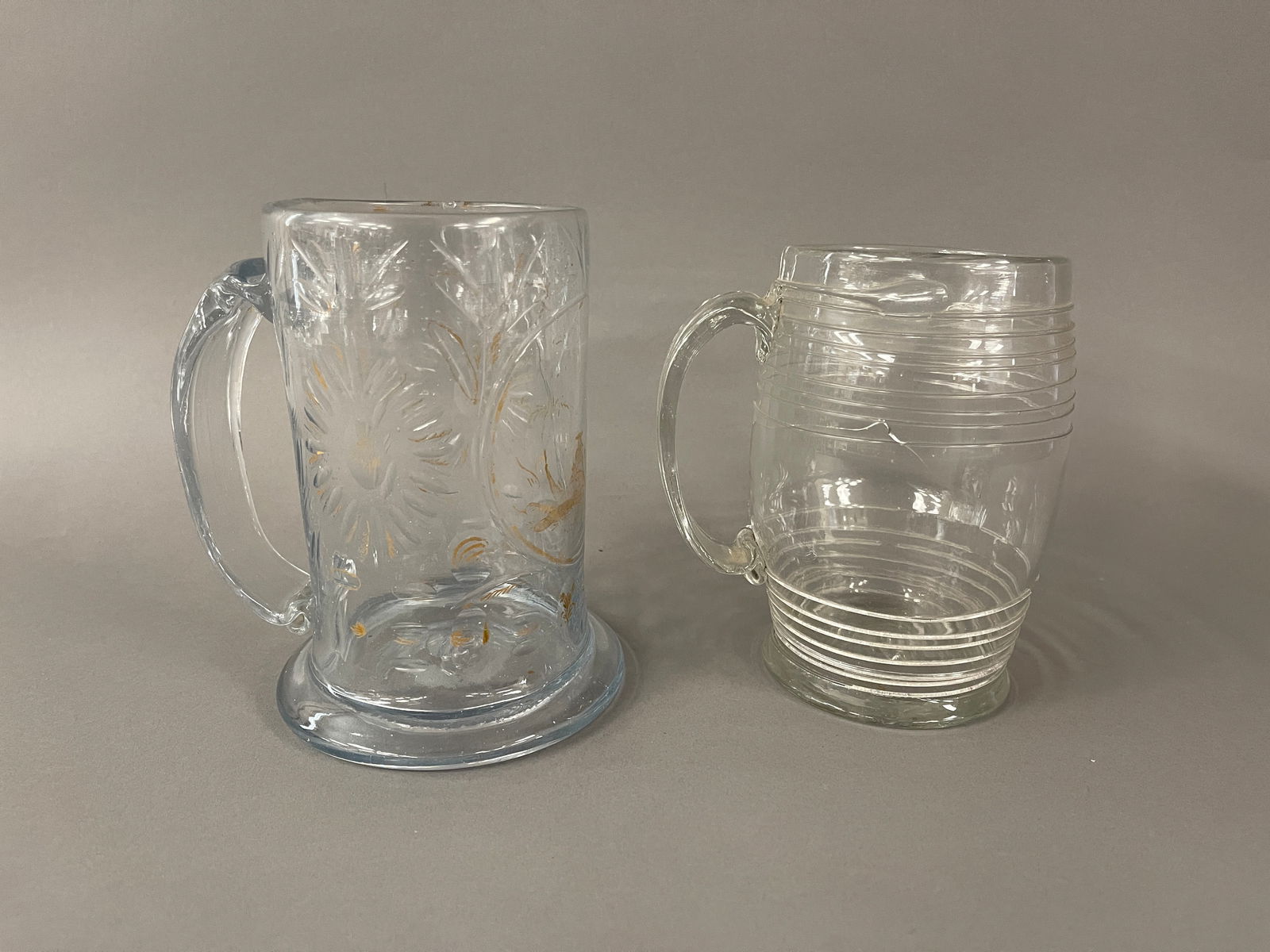 TWO BLOWN GLASS  TANKARDS (1 of 4)