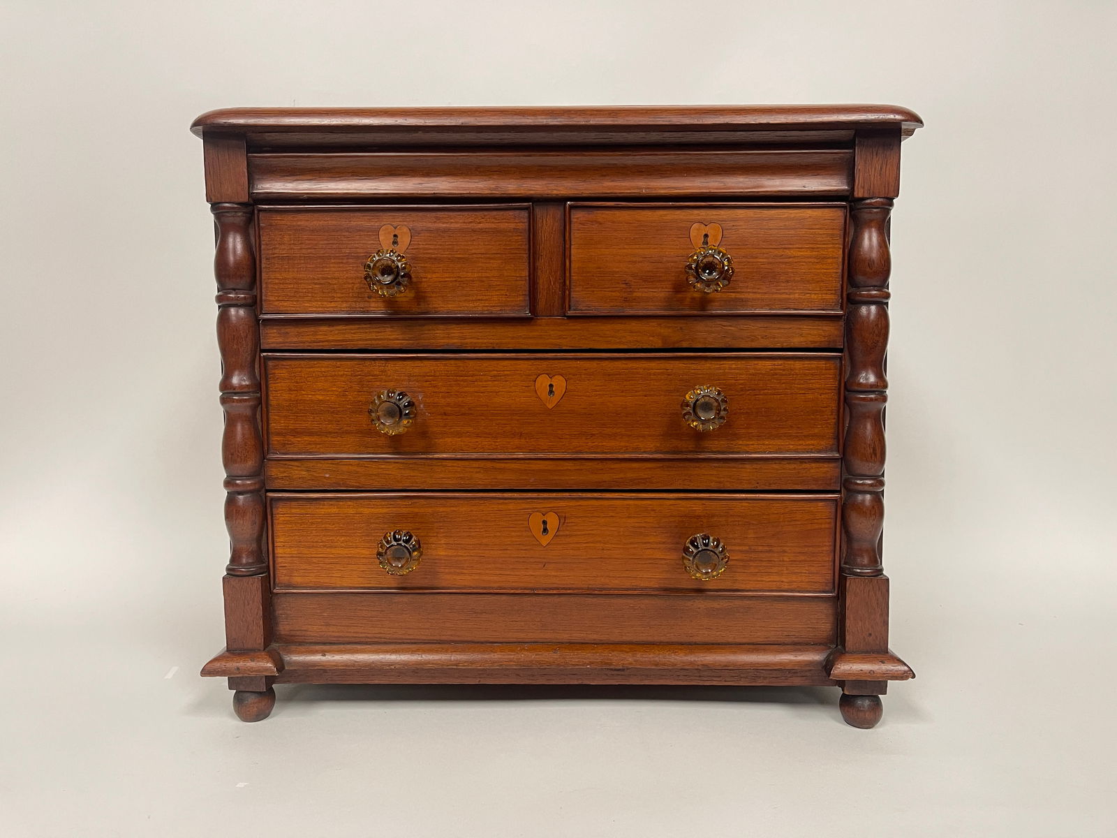 DIMINUTIVE TWO OVER TWO CHEST OF DRAWERS (1 of 7)