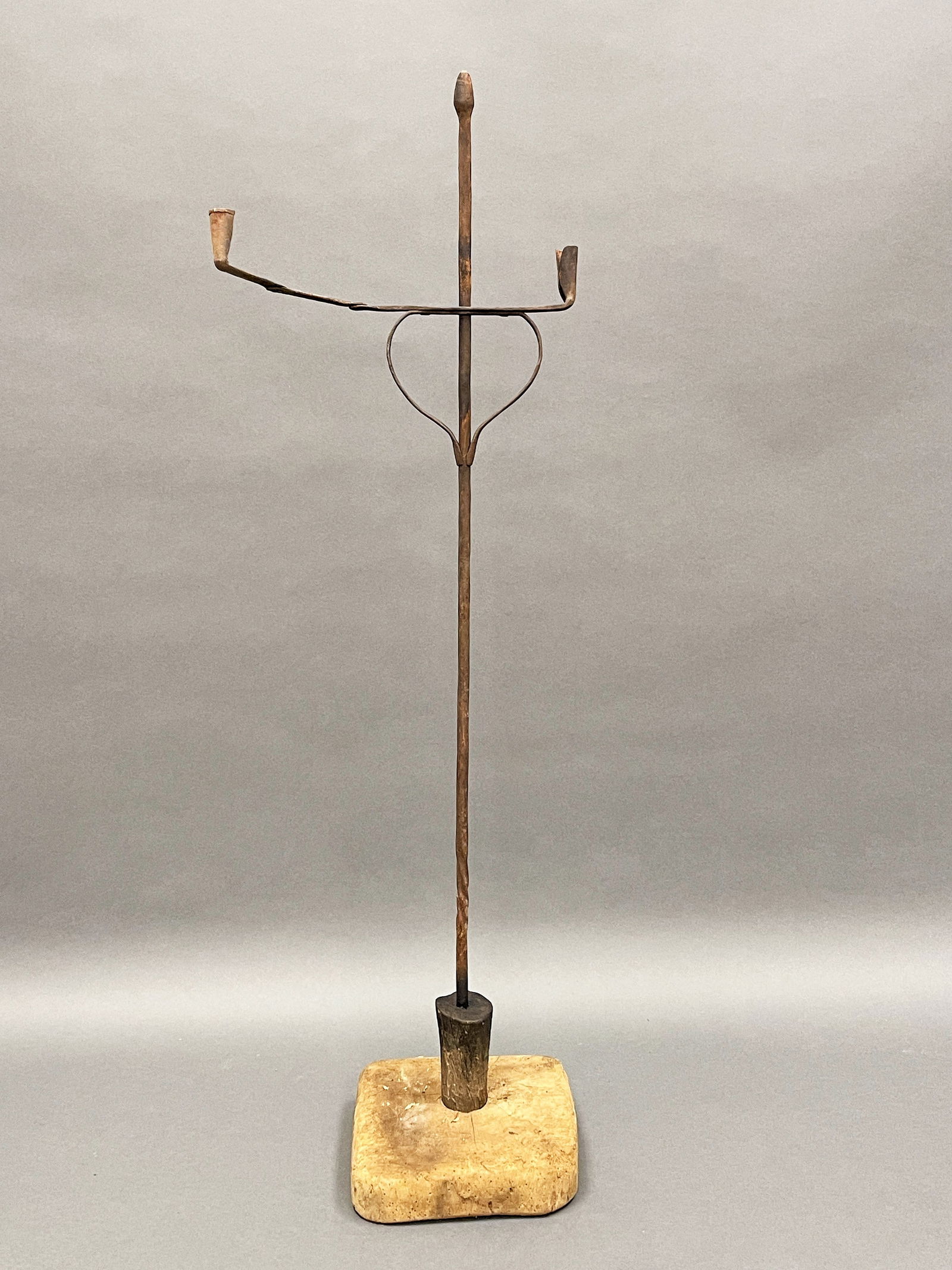 EARLY TALL FORGED IRON CANDLE STANDARD WITH ANCIENT WOODEN BLOCK BASE (1 of 3)
